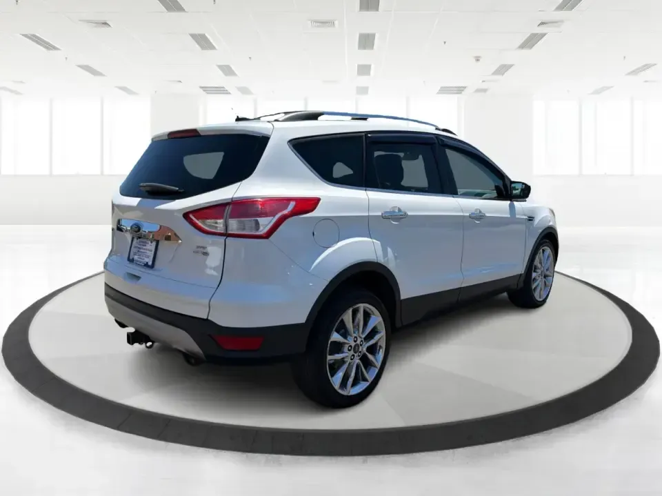 2015 Ford Escape SE (1FMCU9G92FU) with an EcoBoost 1.6L I-4 gasoline direct injection engine, 6-Speed Automatic transmission, located at 401 Woodman Dr, Riverside, OH, 45431, (937) 908-9800, 39.760899, -84.123421 - Need a do-it-all SUV for Dayton-area commutes, school drop-offs, and spontaneous weekend getaways? This 2015 Ford Escape SE 4WD is built for real life in Riverside, Ohio-comfortable for daily runs down Woodman Dr, confident on slick winter mornings, and efficient enough for longer drives toward Down - Photo#2