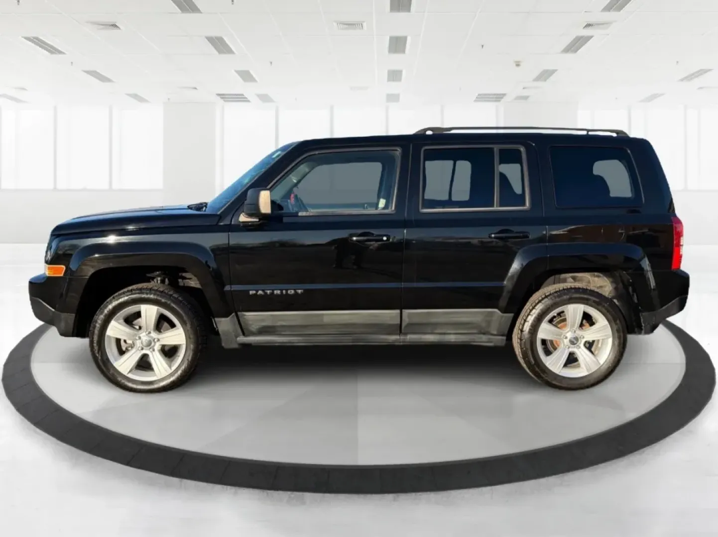 2012 Jeep Patriot Latitude (1C4NJRFB1CD) with an 2.4L I-4 DOHC engine, located at 1099 N County Rd 25A , Troy, OH, 45373, (937) 908-9800, 40.057079, -84.212883 - Experience the thrill of adventure with the 2012 Jeep Patriot Latitude, now available at Advantage Car and Credit in Troy, OH! Perfect for weekend getaways or daily commutes, this versatile SUV is designed to meet the needs of both adventure-seekers and budget-conscious buyers alike. With its rugged - Photo#5
