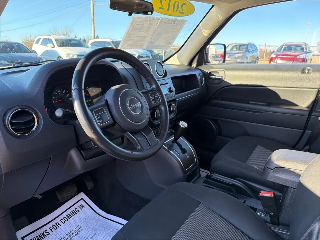 2012 Jeep Patriot Latitude (1C4NJRFB1CD) with an 2.4L I-4 DOHC engine, located at 1099 N County Rd 25A , Troy, OH, 45373, (937) 908-9800, 40.057079, -84.212883 - Experience the thrill of adventure with the 2012 Jeep Patriot Latitude, now available at Advantage Car and Credit in Troy, OH! Perfect for weekend getaways or daily commutes, this versatile SUV is designed to meet the needs of both adventure-seekers and budget-conscious buyers alike. With its rugged - Photo#9