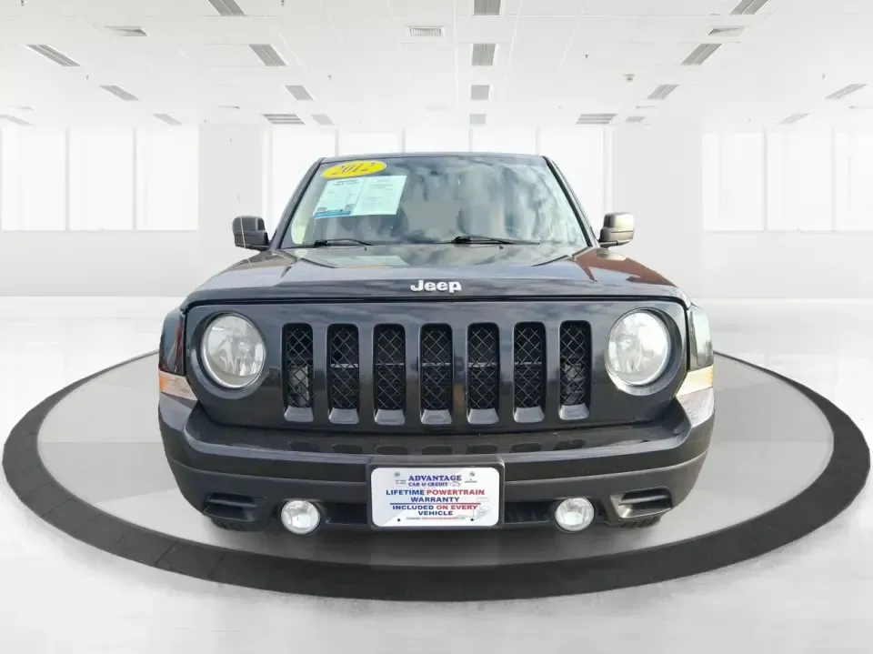 2012 Jeep Patriot Latitude (1C4NJRFB1CD) with an 2.4L I-4 DOHC engine, Automatic transmission, located at 8750 N County Rd 25A, Piqua, OH, 45356, (937) 908-9800, 40.164391, -84.232513 - Experience the thrill of adventure with the 2012 Jeep Patriot Latitude, now available at Advantage Car and Credit in Troy, OH! Perfect for weekend getaways or daily commutes, this versatile SUV is designed to meet the needs of both adventure-seekers and budget-conscious buyers alike. With its rugged - Photo#7