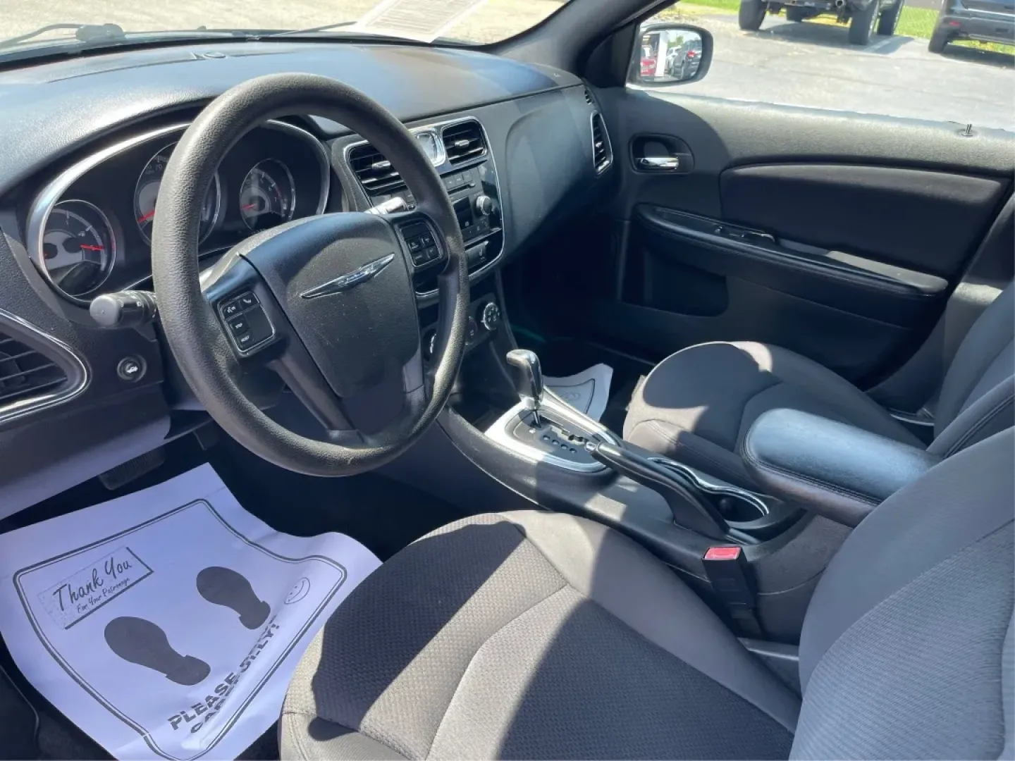 2014 Chrysler 200 LX (1C3CCBAG7EN) with an Other engine, located at 4508 South Dixie Dr, Moraine, OH, 45439, (937) 908-9800, 39.689976, -84.218452 - Are you looking for a reliable car that seamlessly fits into your busy lifestyle? Look no further than this stunning 2014 Chrysler 200 LX, available now at Advantage Car and Credit in Fairborn, OH. This stylish sedan is perfect for growing families, daily commuters, or anyone seeking a dependable ve - Photo#9