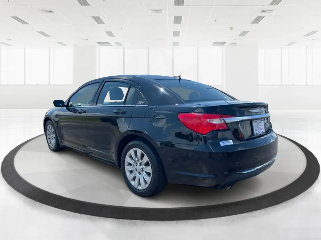 2014 Chrysler 200 LX (1C3CCBAG7EN) with an Other engine, located at 1230 East Main St, Xenia, OH, 45385, (937) 908-9800, 39.688026, -83.910172 - Are you looking for a reliable car that seamlessly fits into your busy lifestyle? Look no further than this stunning 2014 Chrysler 200 LX, available now at Advantage Car and Credit in Fairborn, OH. This stylish sedan is perfect for growing families, daily commuters, or anyone seeking a dependable ve - Photo#4