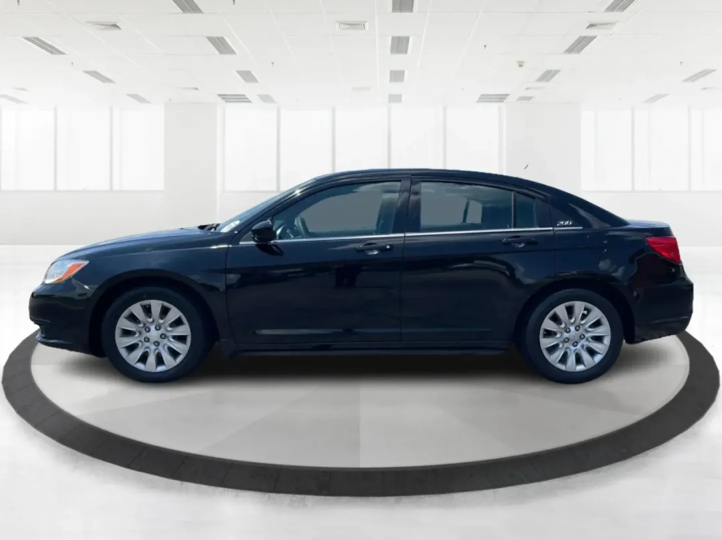 2014 Chrysler 200 LX (1C3CCBAG7EN) with an Other engine, located at 880 E. National Road, Vandalia, OH, 45377, (937) 908-9800, 39.891918, -84.183594 - Are you looking for a reliable car that seamlessly fits into your busy lifestyle? Look no further than this stunning 2014 Chrysler 200 LX, available now at Advantage Car and Credit in Fairborn, OH. This stylish sedan is perfect for growing families, daily commuters, or anyone seeking a dependable ve - Photo#5