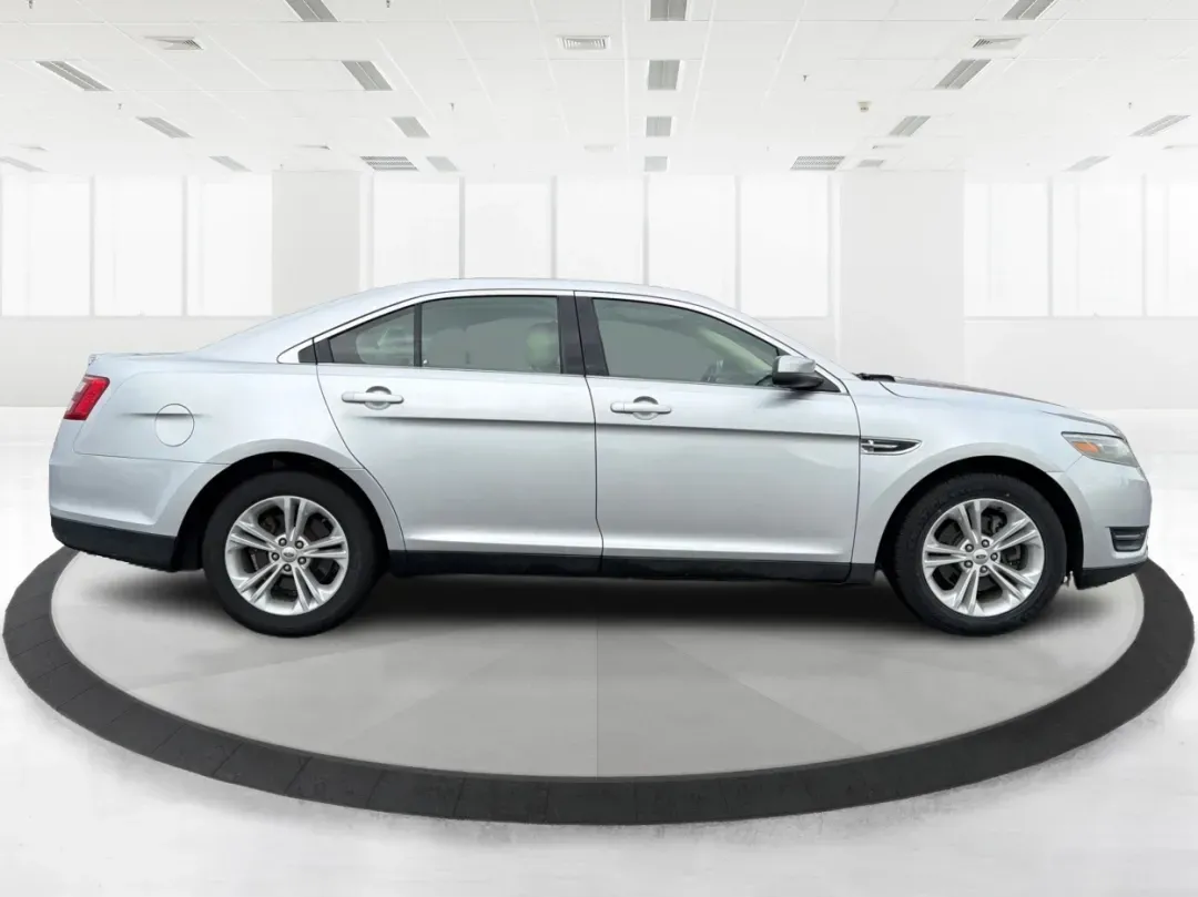 2013 Ford Taurus SEL (1FAHP2H87DG) with an 3.5L V-6 DOHC engine, located at 8750 N County Rd 25A, Piqua, OH, 45356, (937) 908-9800, 40.164391, -84.232513 - **Discover the Perfect Family Sedan: 2013 Ford Taurus SEL at Advantage Car and Credit - Piqua, OH**<br /> <br /> Are you searching for a reliable and spacious vehicle that fits seamlessly into your family's lifestyle? Look no further than this 2013 Ford Taurus SEL, available now at Advantage Car and - Photo#1