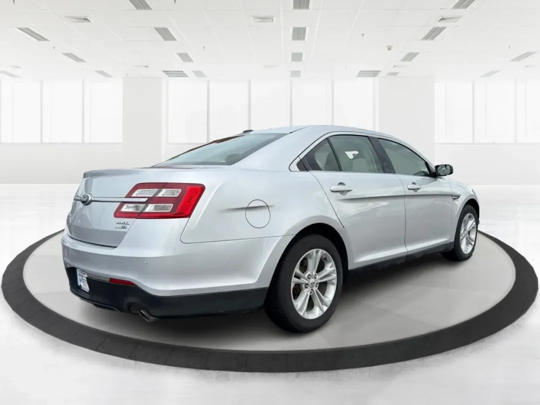 2013 Ford Taurus SEL (1FAHP2H87DG) with an 3.5L V-6 DOHC engine, located at 8750 N County Rd 25A, Piqua, OH, 45356, (937) 908-9800, 40.164391, -84.232513 - **Discover the Perfect Family Sedan: 2013 Ford Taurus SEL at Advantage Car and Credit - Piqua, OH**<br /> <br /> Are you searching for a reliable and spacious vehicle that fits seamlessly into your family's lifestyle? Look no further than this 2013 Ford Taurus SEL, available now at Advantage Car and - Photo#2