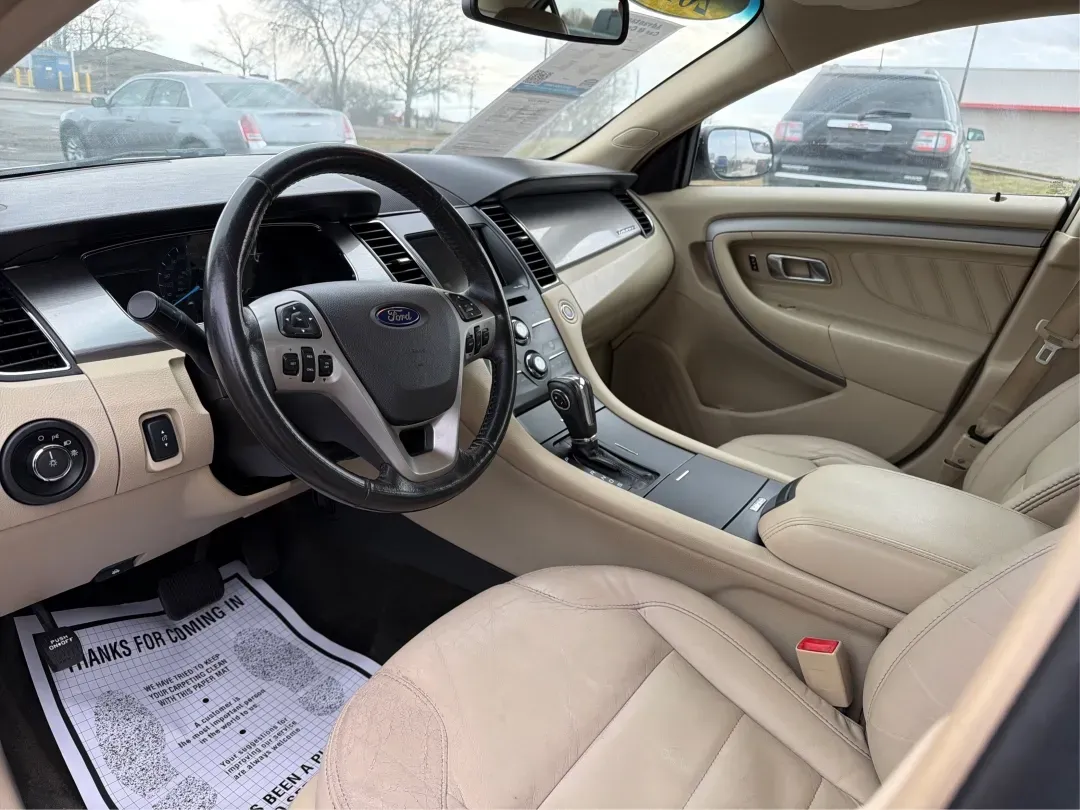 2013 Ford Taurus SEL (1FAHP2H87DG) with an 3.5L V-6 DOHC engine, located at 8750 N County Rd 25A, Piqua, OH, 45356, (937) 908-9800, 40.164391, -84.232513 - **Discover the Perfect Family Sedan: 2013 Ford Taurus SEL at Advantage Car and Credit - Piqua, OH**<br /> <br /> Are you searching for a reliable and spacious vehicle that fits seamlessly into your family's lifestyle? Look no further than this 2013 Ford Taurus SEL, available now at Advantage Car and - Photo#9