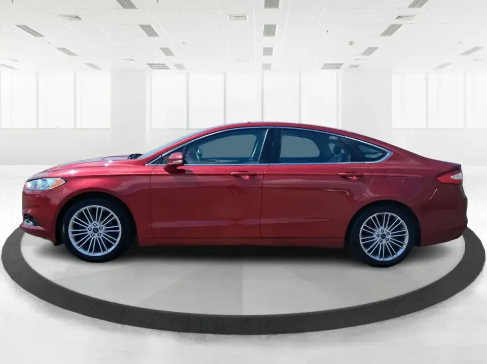 2016 Ford Fusion SE (3FA6P0HD7GR) with an 1.5L L4 DOHC 16V engine, 6-Speed Automatic transmission, located at 1099 N County Rd 25A , Troy, OH, 45373, (937) 908-9800, 40.057079, -84.212883 - Experience the perfect blend of style, comfort, and reliability with this 2016 Ford Fusion SE, available now at Advantage Car and Credit in Fairborn, OH. Whether you're a commuter navigating the busy streets of downtown Fairborn or a growing family looking for a dependable vehicle for your weekend a - Photo#5