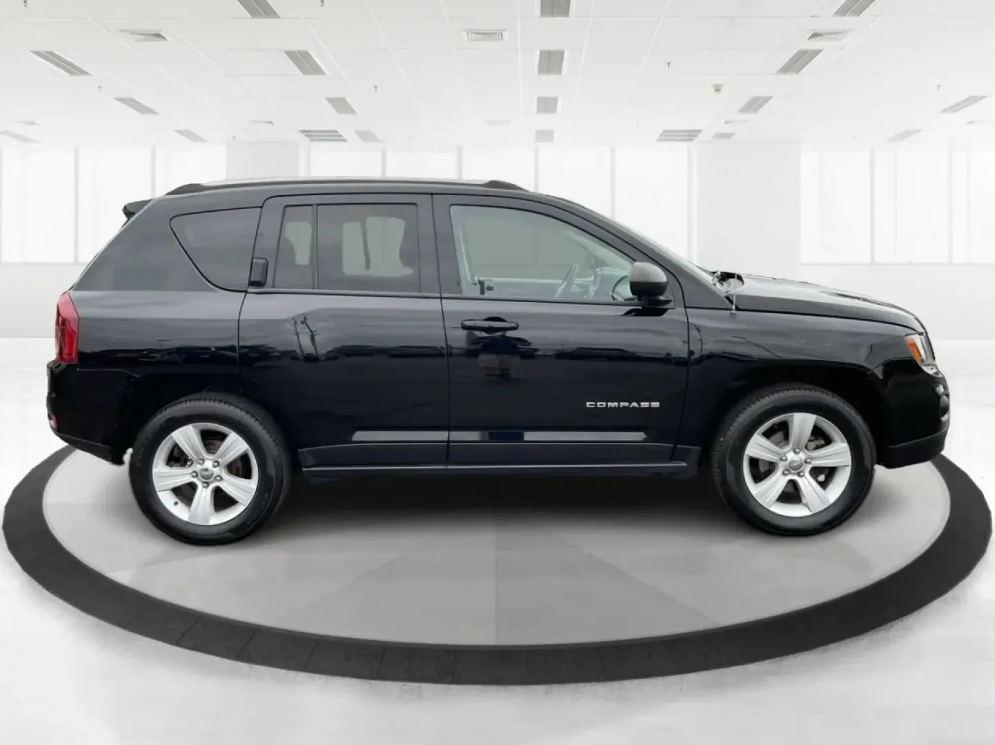 2014 Jeep Compass Sport (1C4NJDBBXED) with an 2.4L I-4 DOHC engine, located at 1951 S Dayton Lakeview Rd., New Carlisle, OH, 45344, (937) 908-9800, 39.890999, -84.050255 - Experience the thrill of adventure and the comfort of a reliable ride with this stunning 2014 Jeep Compass Sport, available now at Advantage Car and Credit in New Carlisle, OH. Perfect for weekend getaways or daily commutes, this versatile SUV balances style, performance, and practicality, making it - Photo#1