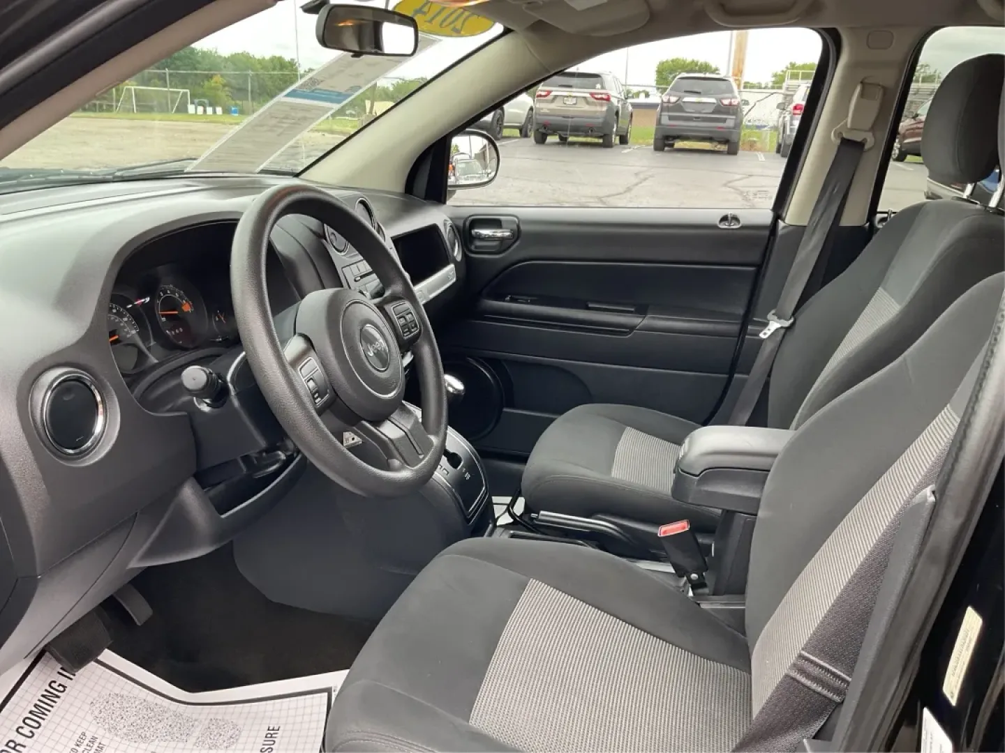 2014 Jeep Compass Sport (1C4NJDBBXED) with an 2.4L I-4 DOHC engine, located at 1951 S Dayton Lakeview Rd., New Carlisle, OH, 45344, (937) 908-9800, 39.890999, -84.050255 - Experience the thrill of adventure and the comfort of a reliable ride with this stunning 2014 Jeep Compass Sport, available now at Advantage Car and Credit in New Carlisle, OH. Perfect for weekend getaways or daily commutes, this versatile SUV balances style, performance, and practicality, making it - Photo#9