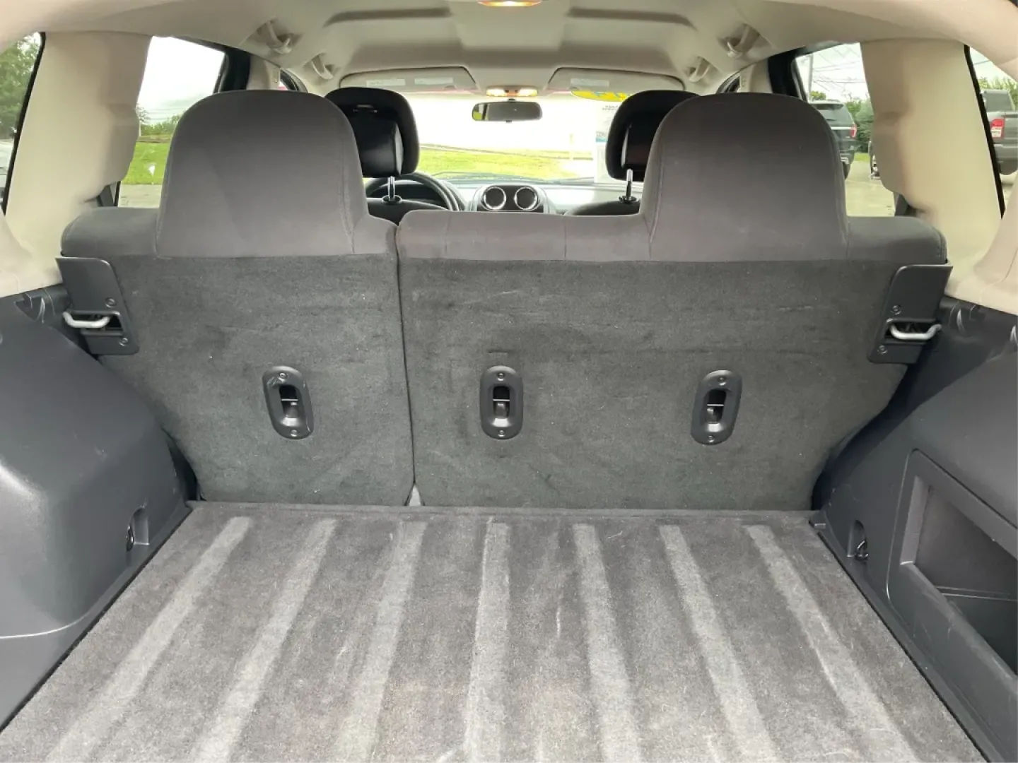 2014 Jeep Compass Sport (1C4NJDBBXED) with an 2.4L I-4 DOHC engine, located at 1951 S Dayton Lakeview Rd., New Carlisle, OH, 45344, (937) 908-9800, 39.890999, -84.050255 - Experience the thrill of adventure and the comfort of a reliable ride with this stunning 2014 Jeep Compass Sport, available now at Advantage Car and Credit in New Carlisle, OH. Perfect for weekend getaways or daily commutes, this versatile SUV balances style, performance, and practicality, making it - Photo#12