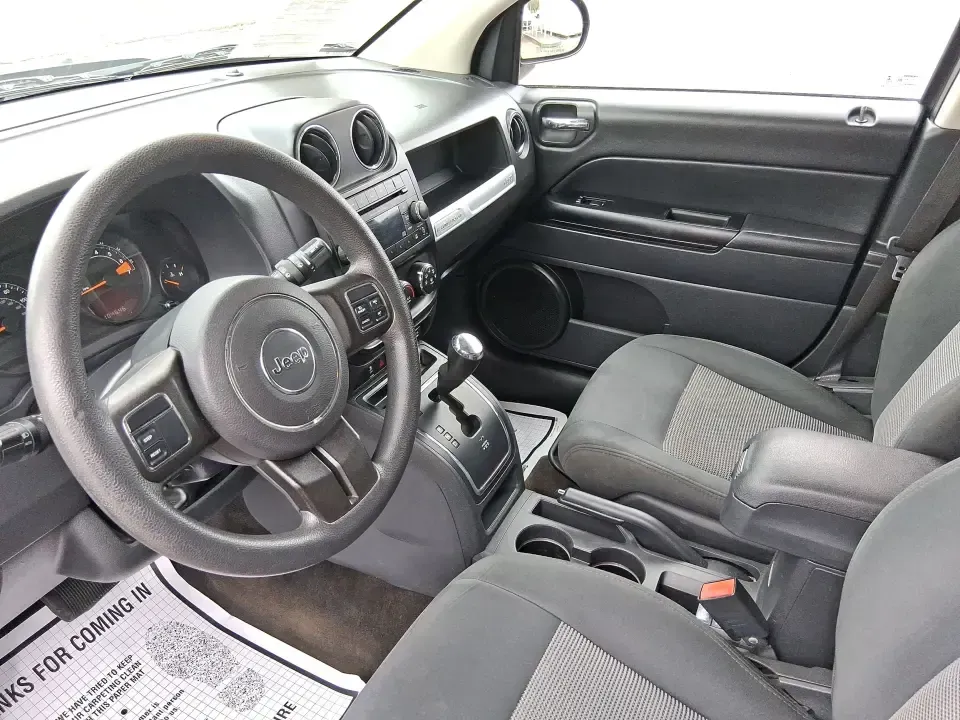 2016 Jeep Compass Sport (1C4NJDBB8GD) with an 2.4L I-4 DOHC engine, Automatic transmission, located at 1099 N County Rd 25A , Troy, OH, 45373, (937) 908-9800, 40.057079, -84.212883 - **Unleash Your Adventurous Spirit with the 2016 Jeep Compass Sport Perfect for Weekend Getaways!**<br /> <br /> Are you ready to elevate your outdoor adventures? The 2016 Jeep Compass Sport is your ticket to exploring the rugged terrains while keeping comfort and style at the forefront. Perfect for - Photo#9