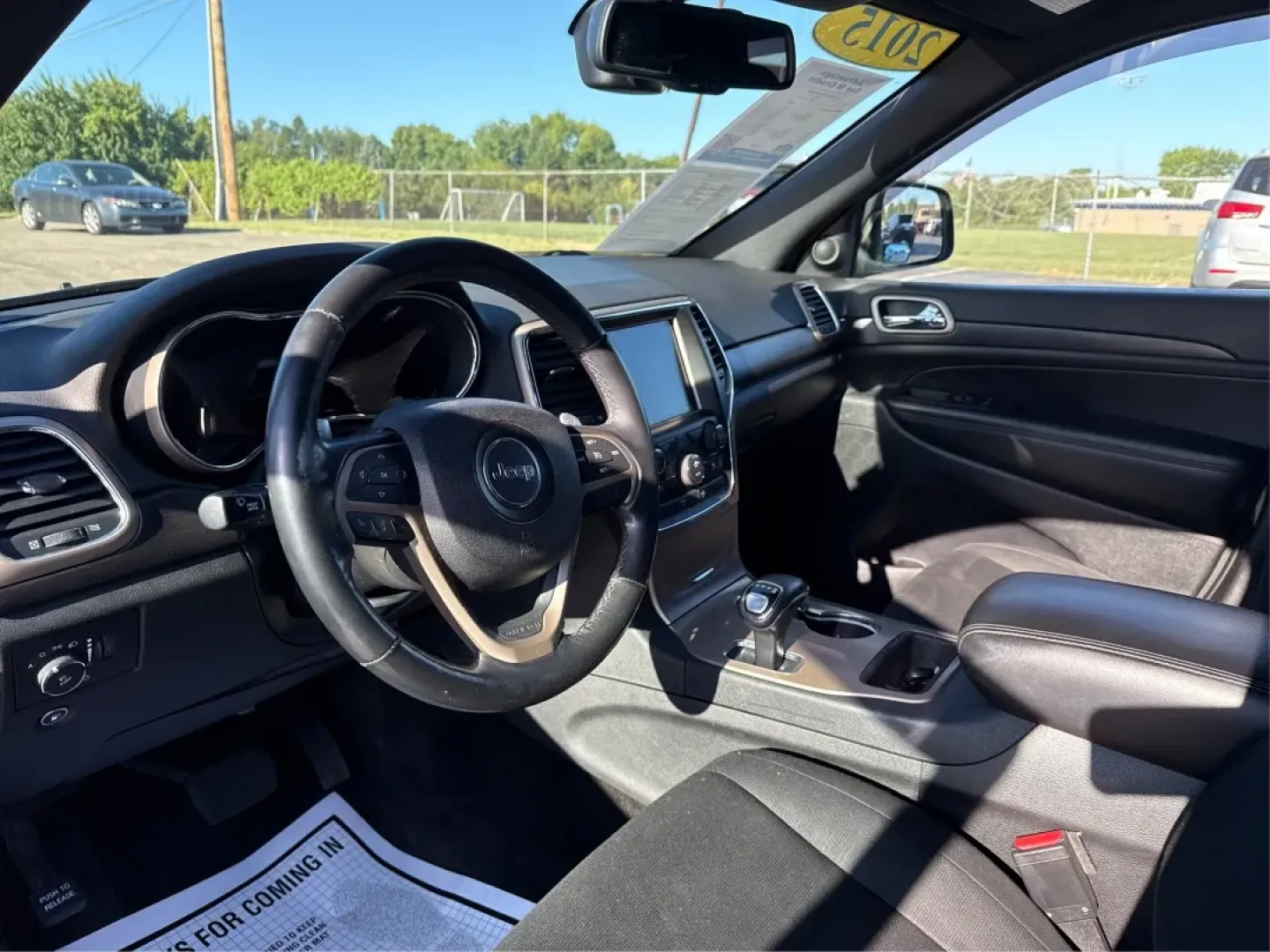2015 Jeep Grand Cherokee Laredo (1C4RJFAG0FC) with an 3.6L V-6 DOHC engine, located at 8750 N County Rd 25A, Piqua, OH, 45356, (937) 908-9800, 40.164391, -84.232513 - **Get Ready for Adventure with the 2015 Jeep Grand Cherokee Laredo at Advantage Car and Credit Piqua, OH!**<br /> <br /> Are you looking for the perfect vehicle to accommodate your adventurous lifestyle or growing family? Look no further than this stunning 2015 Jeep Grand Cherokee Laredo, available - Photo#9