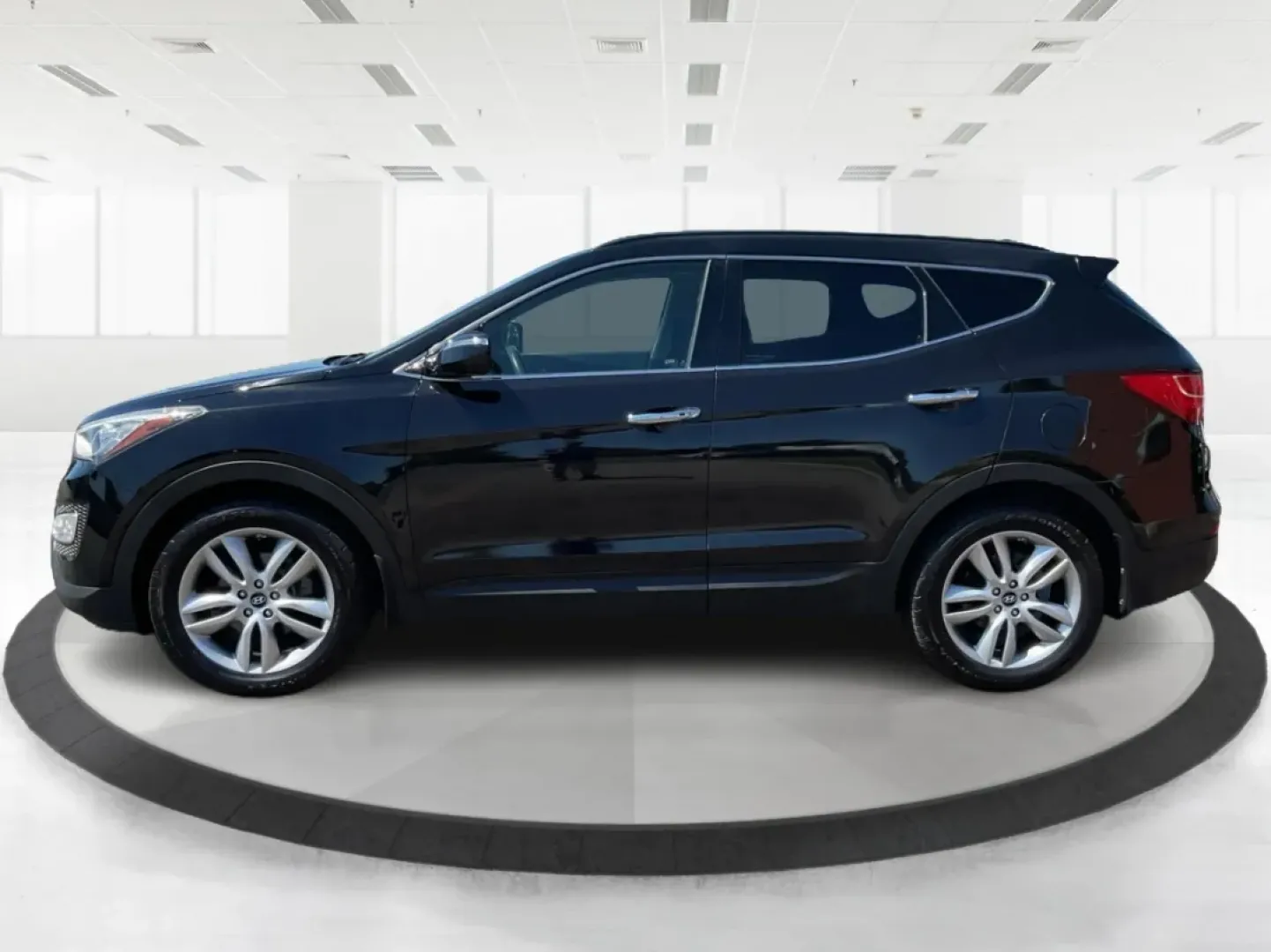 2014 Hyundai Santa Fe 2.0L Turbo (5XYZUDLA5EG) with an Theta II 2L I-4 gasoline direct injection engine, located at 8750 N County Rd 25A, Piqua, OH, 45356, (937) 908-9800, 40.164391, -84.232513 - Experience the thrill of adventure and family outings with our stunning 2014 Hyundai Santa Fe, available now at Advantage Car and Credit - Piqua, your friendly Buy Here Pay Here dealership located at 8750 N County Rd 25A, Piqua, OH 45356. This versatile SUV is designed for those who crave comfort, r - Photo#5