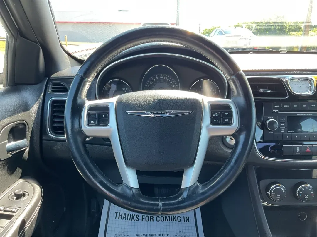 2012 Chrysler 200 Touring (1C3CCBBG4CN) with an Other engine, located at 1099 N County Rd 25A , Troy, OH, 45373, (937) 908-9800, 40.057079, -84.212883 - Unleash your driving potential with the perfect blend of style, comfort, and functionality-ideal for growing families or anyone seeking a reliable commuter vehicle. Introducing the 2012 Chrysler 200 Touring sedan, now available at Advantage Car and Credit in Troy, OH. Located at 1099 N County Rd 25A - Photo#16