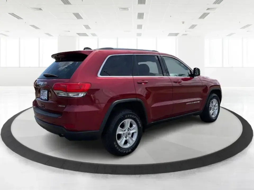 2015 Jeep Grand Cherokee Laredo (1C4RJFAG3FC) with an 3.6L V6 engine, 8-speed automatic transmission, located at 401 Woodman Dr, Riverside, OH, 45431, (937) 908-9800, 39.760899, -84.123421 - Picture the next Ohio weekend: you load up the family, point the hood toward the bike paths around Eastwood MetroPark, and let a confident 4WD SUV handle whatever the forecast throws at I-70, Route 35, or the back roads near Wright-Patterson Air Force Base. This 2015 Jeep Grand Cherokee Laredo in De- Photo#2