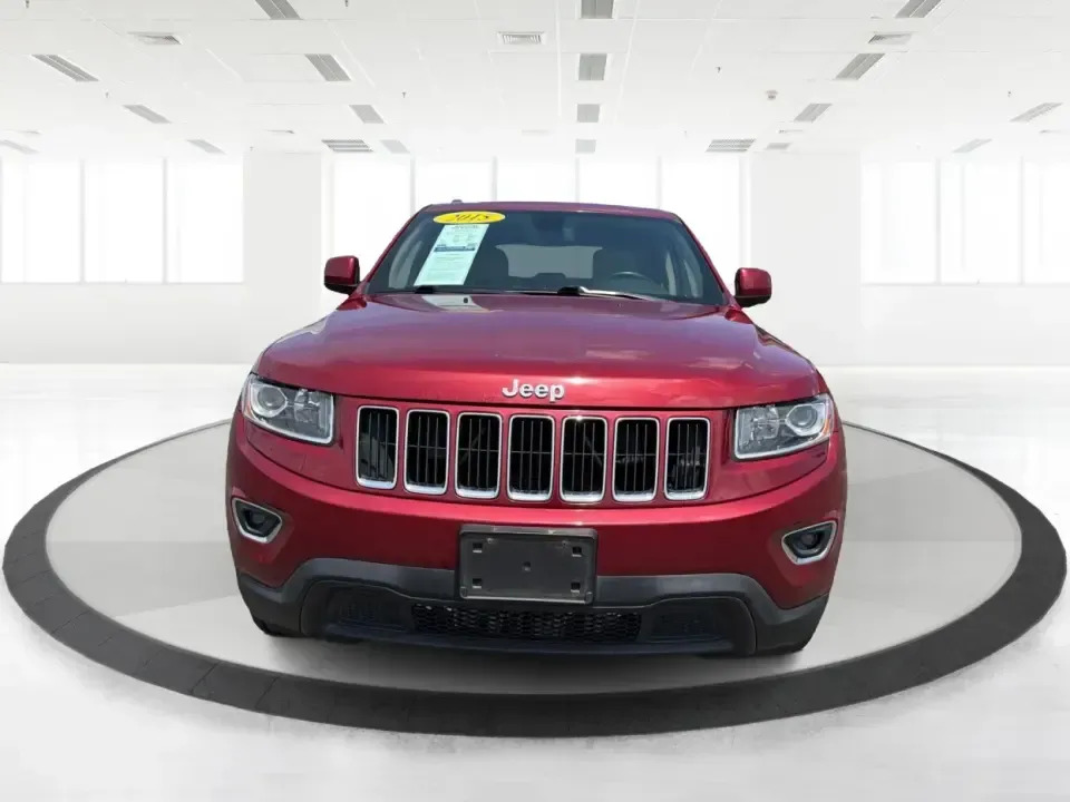 2015 Jeep Grand Cherokee Laredo (1C4RJFAG3FC) with an 3.6L V6 engine, 8-speed automatic transmission, located at 401 Woodman Dr, Riverside, OH, 45431, (937) 908-9800, 39.760899, -84.123421 - Picture the next Ohio weekend: you load up the family, point the hood toward the bike paths around Eastwood MetroPark, and let a confident 4WD SUV handle whatever the forecast throws at I-70, Route 35, or the back roads near Wright-Patterson Air Force Base. This 2015 Jeep Grand Cherokee Laredo in De- Photo#7