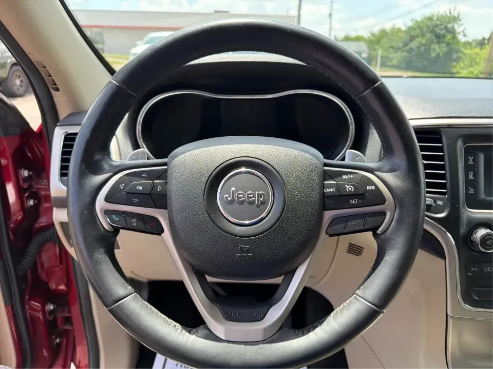 2015 Jeep Grand Cherokee Laredo (1C4RJFAG3FC) with an 3.6L V6 engine, 8-speed automatic transmission, located at 401 Woodman Dr, Riverside, OH, 45431, (937) 908-9800, 39.760899, -84.123421 - Picture the next Ohio weekend: you load up the family, point the hood toward the bike paths around Eastwood MetroPark, and let a confident 4WD SUV handle whatever the forecast throws at I-70, Route 35, or the back roads near Wright-Patterson Air Force Base. This 2015 Jeep Grand Cherokee Laredo in De- Photo#16