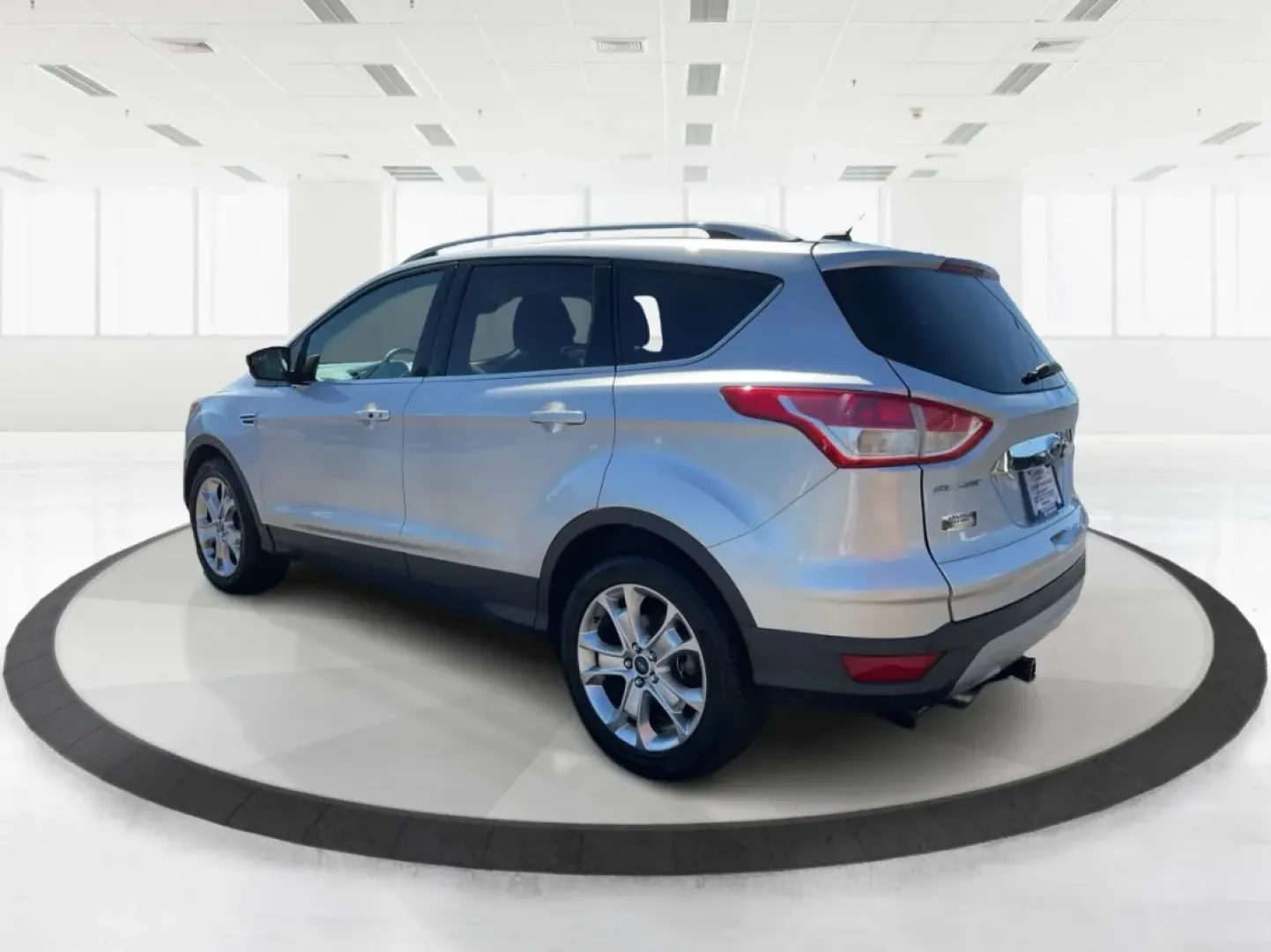 2014 Ford Escape Titanium (1FMCU9J91EU) with an Other engine, located at 1230 East Main St, Xenia, OH, 45385, (937) 908-9800, 39.688026, -83.910172 - **Explore the Open Road with Confidence in This 2014 Ford Escape Titanium!**<br /> <br /> Are you ready to elevate your adventures with a reliable SUV that meets the diverse needs of your lifestyle? The 2014 Ford Escape Titanium is the ideal vehicle for families, commuters, and weekend warriors alik - Photo#4