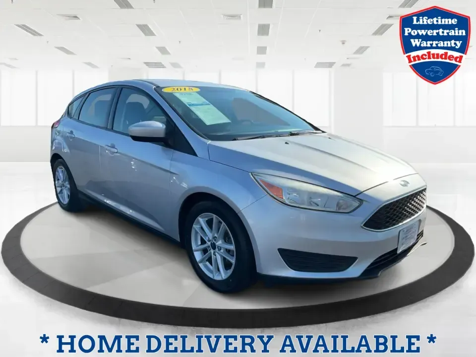 2018 Ford Focus SE Hatch (1FADP3K23JL) with an 2.0L L4 DOHC 16V engine, Automatic transmission, located at 8750 N County Rd 25A, Piqua, OH, 45356, (937) 908-9800, 40.164391, -84.232513 - Busy weekdays, long commutes up I75, and quick weekend getaways to the Great Miami River Trail call for a car that's easy to live with, easy to park, and efficient to run. This 2018 Ford Focus SE Hatchback in Ingot Silver Metallic fits that lifestyle with the versatility of a hatch, the confidence o - Photo#0