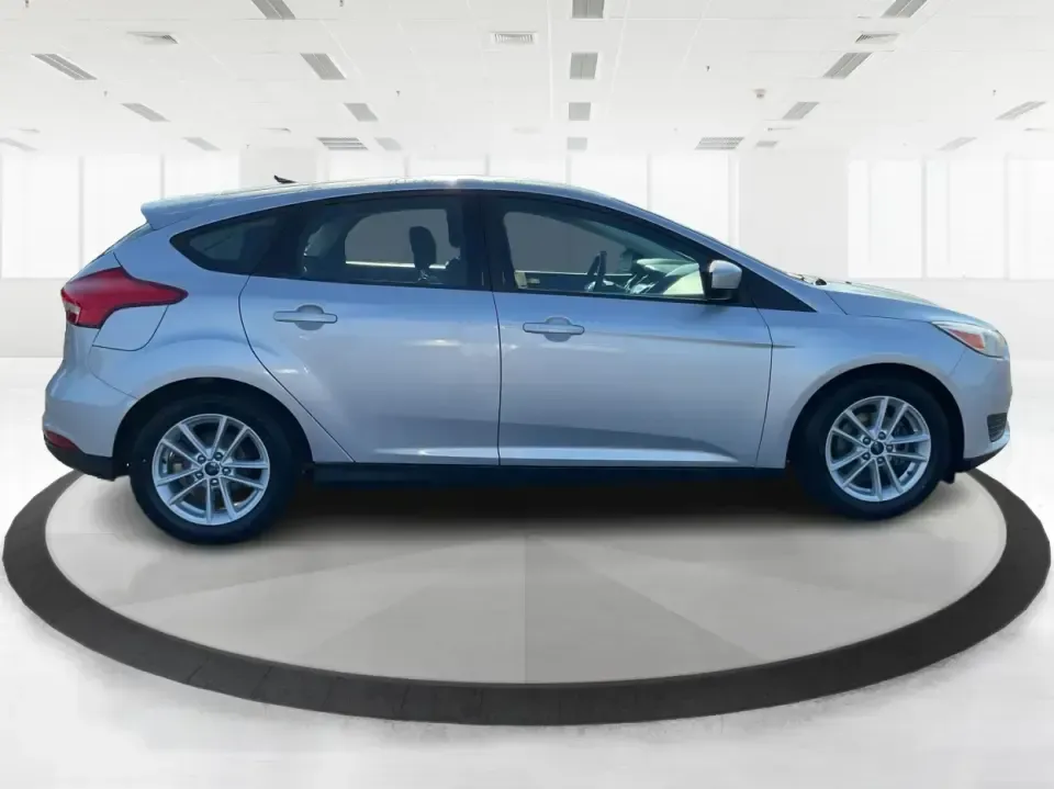 2018 Ford Focus SE Hatch (1FADP3K23JL) with an 2.0L L4 DOHC 16V engine, Automatic transmission, located at 8750 N County Rd 25A, Piqua, OH, 45356, (937) 908-9800, 40.164391, -84.232513 - Busy weekdays, long commutes up I75, and quick weekend getaways to the Great Miami River Trail call for a car that's easy to live with, easy to park, and efficient to run. This 2018 Ford Focus SE Hatchback in Ingot Silver Metallic fits that lifestyle with the versatility of a hatch, the confidence o - Photo#1