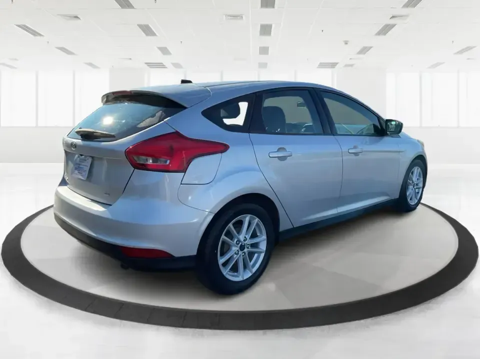 2018 Ford Focus SE Hatch (1FADP3K23JL) with an 2.0L L4 DOHC 16V engine, Automatic transmission, located at 8750 N County Rd 25A, Piqua, OH, 45356, (937) 908-9800, 40.164391, -84.232513 - Busy weekdays, long commutes up I75, and quick weekend getaways to the Great Miami River Trail call for a car that's easy to live with, easy to park, and efficient to run. This 2018 Ford Focus SE Hatchback in Ingot Silver Metallic fits that lifestyle with the versatility of a hatch, the confidence o - Photo#2