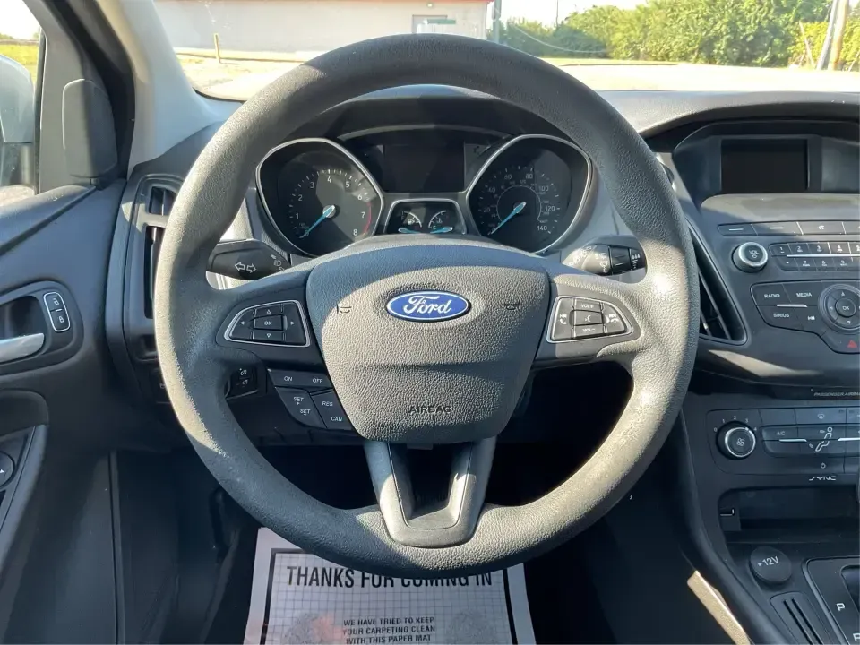 2018 Ford Focus SE Hatch (1FADP3K23JL) with an 2.0L L4 DOHC 16V engine, Automatic transmission, located at 8750 N County Rd 25A, Piqua, OH, 45356, (937) 908-9800, 40.164391, -84.232513 - Busy weekdays, long commutes up I75, and quick weekend getaways to the Great Miami River Trail call for a car that's easy to live with, easy to park, and efficient to run. This 2018 Ford Focus SE Hatchback in Ingot Silver Metallic fits that lifestyle with the versatility of a hatch, the confidence o - Photo#16
