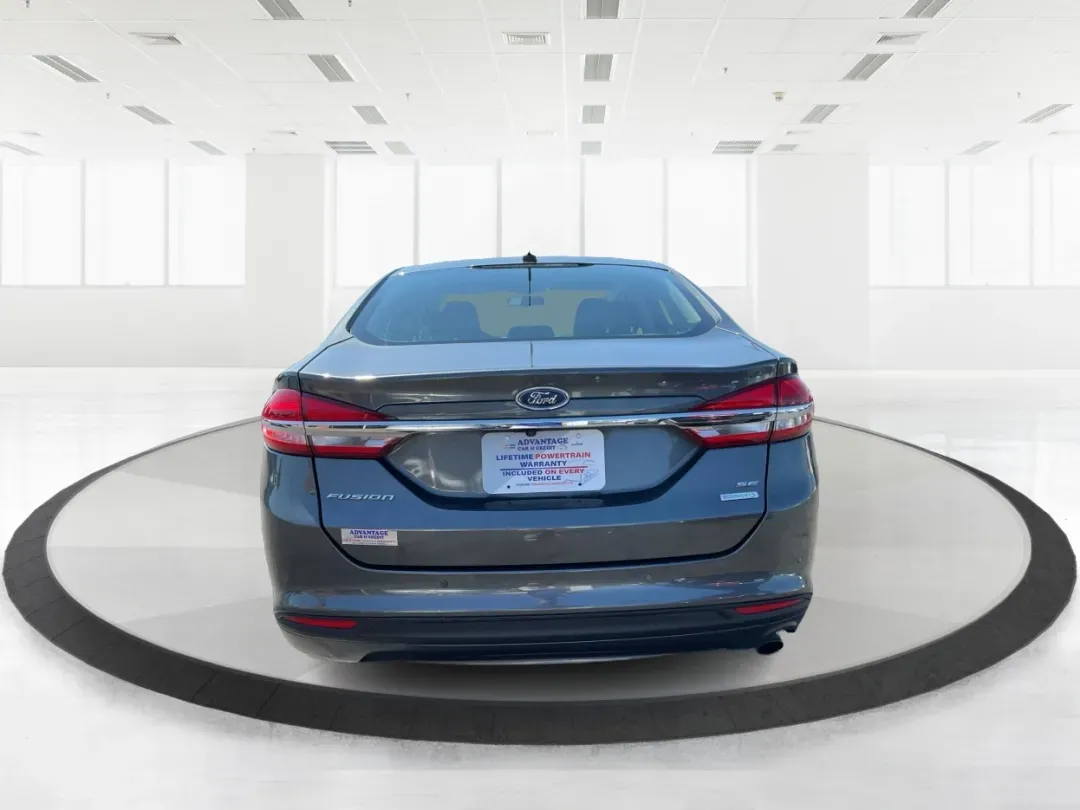 2018 Ford Fusion SE (3FA6P0HD3JR) with an 1.5L L4 DOHC 16V engine, 6A transmission, located at 1099 N County Rd 25A , Troy, OH, 45373, (937) 908-9800, 40.057079, -84.212883 - Looking for a reliable sedan that combines style, comfort, and practicality? Look no further than the 2018 Ford Fusion SE, available now at Advantage Car and Credit in Vandalia, OH! Perfect for your daily commute, family outings, or even weekend adventures, this vehicle is designed to enhance your l - Photo#3