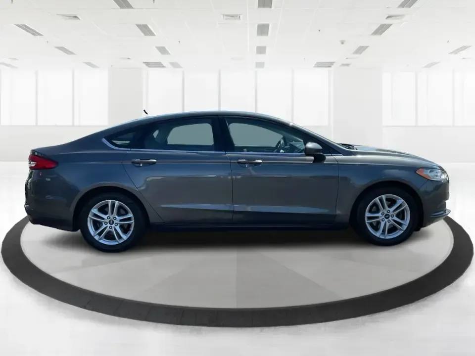 2018 Ford Fusion SE (3FA6P0HD3JR) with an 1.5L L4 DOHC 16V engine, 6A transmission, located at 8750 N County Rd 25A, Piqua, OH, 45356, (937) 908-9800, 40.164391, -84.232513 - Looking for a reliable sedan that combines style, comfort, and practicality? Look no further than the 2018 Ford Fusion SE, available now at Advantage Car and Credit in Vandalia, OH! Perfect for your daily commute, family outings, or even weekend adventures, this vehicle is designed to enhance your l - Photo#1