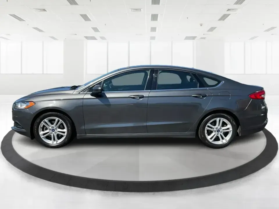 2018 Ford Fusion SE (3FA6P0HD3JR) with an 1.5L L4 DOHC 16V engine, 6A transmission, located at 1184 Kauffman Ave, Fairborn, OH, 45324, (937) 908-9800, 39.807072, -84.030914 - Looking for a reliable sedan that combines style, comfort, and practicality? Look no further than the 2018 Ford Fusion SE, available now at Advantage Car and Credit in Vandalia, OH! Perfect for your daily commute, family outings, or even weekend adventures, this vehicle is designed to enhance your l - Photo#5