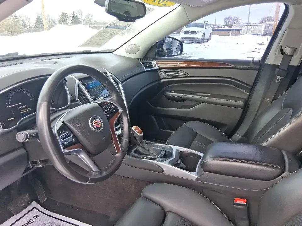 2014 Cadillac SRX Performance Collection (3GYFNCE38ES) with an 3.6L V-6 gasoline direct injection engine, 6-Speed Automatic transmission, located at 8750 N County Rd 25A, Piqua, OH, 45356, (937) 908-9800, 40.164391, -84.232513 - **Experience Luxury and Versatility with the 2014 Cadillac SRX Performance Collection at Advantage Car and Credit - Riverside!**<br /> <br /> Are you in search of a vehicle that accommodates both your daily commutes and weekend adventures while ensuring you travel in style? Look no further than the - Photo#9