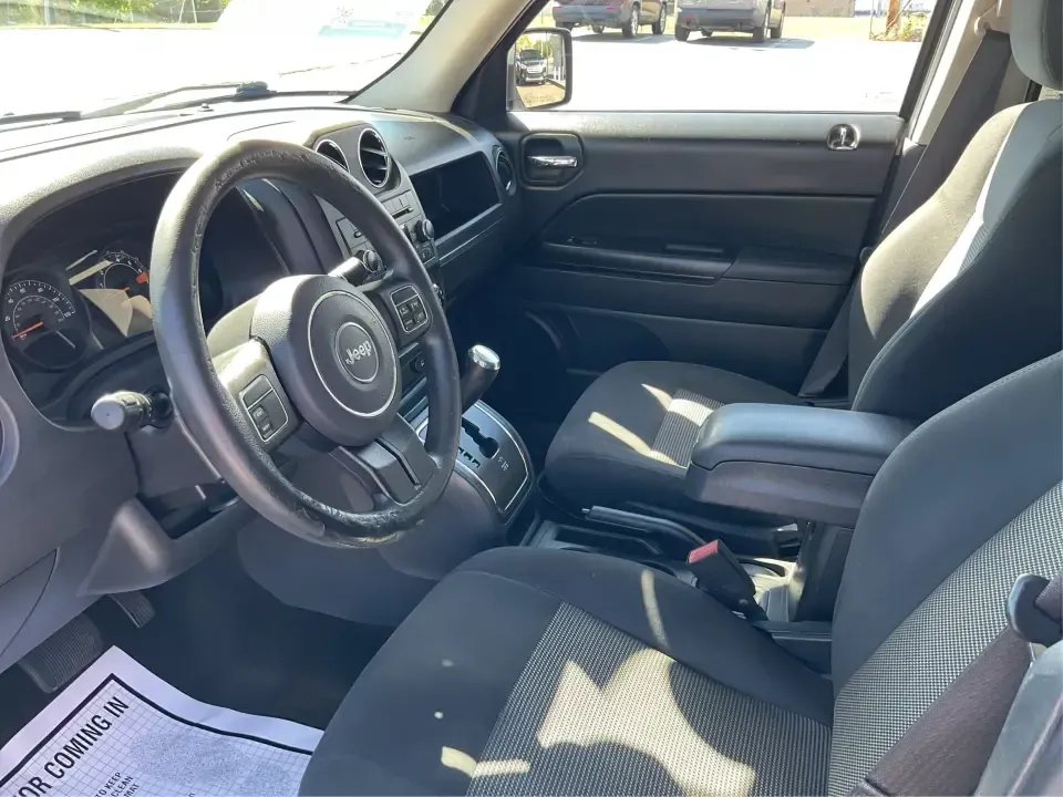 2016 Jeep Patriot Sport (1C4NJPBA0GD) with an 2.0L L4 DOHC 16V engine, Automatic transmission, located at 4508 South Dixie Dr, Moraine, OH, 45439, (937) 908-9800, 39.689976, -84.218452 - **Unleash Your Adventurous Spirit with This 2016 Jeep Patriot Sport!**<br /> <br /> Are you looking for the perfect vehicle to elevate your weekend adventures or a reliable daily commuter? Look no further than this **2016 Jeep Patriot Sport**, now available at **Advantage Car and Credit - Xenia**. N - Photo#9