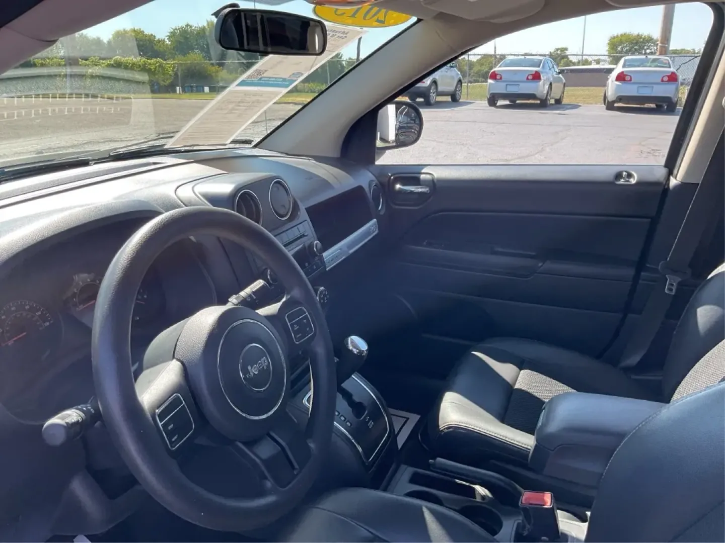 2015 Jeep Compass Altitude Edition (1C4NJCBA6FD) with an 2L I-4 DOHC engine, located at 1951 S Dayton Lakeview Rd., New Carlisle, OH, 45344, (937) 908-9800, 39.890999, -84.050255 - **Adventure Awaits in the 2015 Jeep Compass Altitude Edition at Advantage Car and Credit - Fairborn!**<br /> <br /> Are you ready for your next adventure? The 2015 Jeep Compass Altitude Edition is your perfect companion for weekend getaways, family road trips, or even your daily commute! This versat - Photo#9