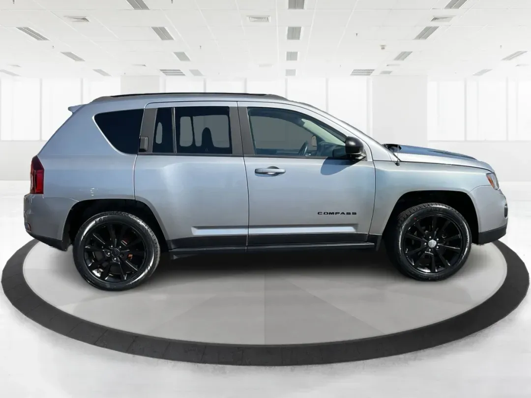 2015 Jeep Compass Altitude Edition (1C4NJCBA6FD) with an 2L I-4 DOHC engine, located at 8750 N County Rd 25A, Piqua, OH, 45356, (937) 908-9800, 40.164391, -84.232513 - 2015 Jeep Compass Altitude Edition - Photo#1