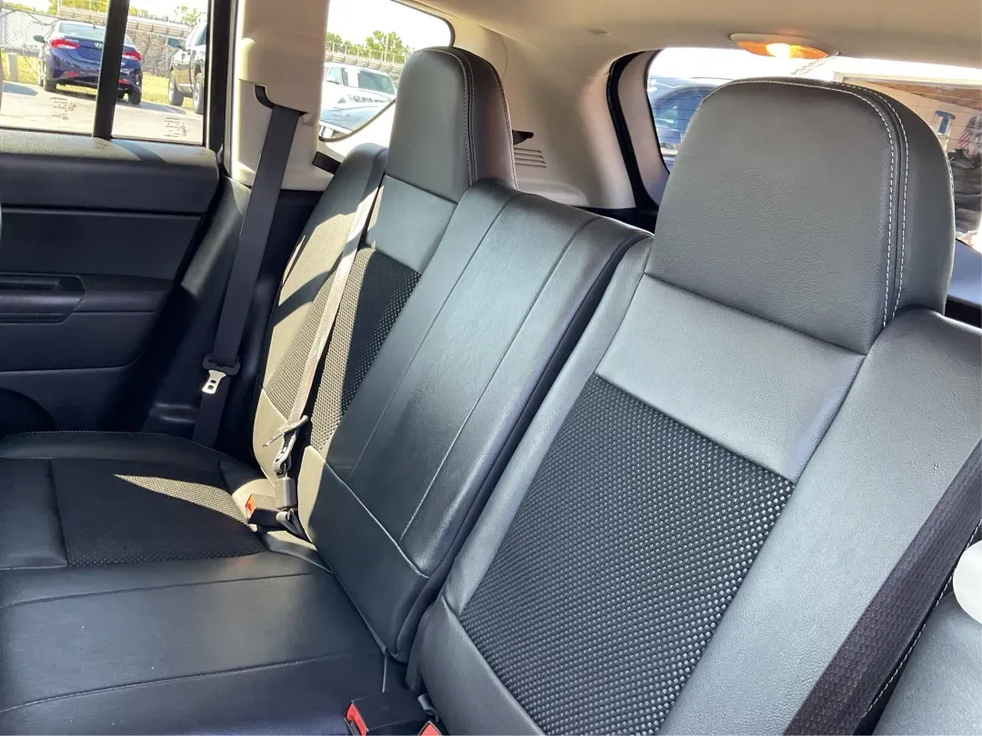 2015 Jeep Compass Altitude Edition (1C4NJCBA6FD) with an 2L I-4 DOHC engine, located at 8750 N County Rd 25A, Piqua, OH, 45356, (937) 908-9800, 40.164391, -84.232513 - 2015 Jeep Compass Altitude Edition - Photo#10