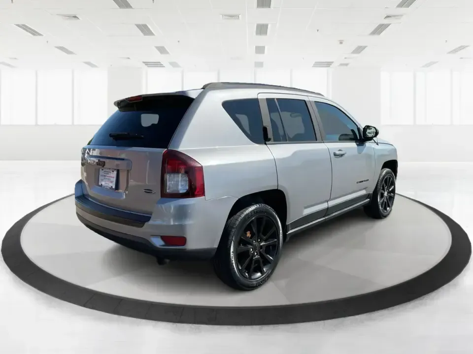 2015 Jeep Compass Altitude Edition (1C4NJCBA6FD) with an 2L I-4 DOHC engine, Continuously Variable Transmission (CVT) transmission, located at 8750 N County Rd 25A, Piqua, OH, 45356, (937) 908-9800, 40.164391, -84.232513 - **Adventure Awaits in the 2015 Jeep Compass Altitude Edition at Advantage Car and Credit - Fairborn!**<br /> <br /> Are you ready for your next adventure? The 2015 Jeep Compass Altitude Edition is your perfect companion for weekend getaways, family road trips, or even your daily commute! This versat - Photo#2