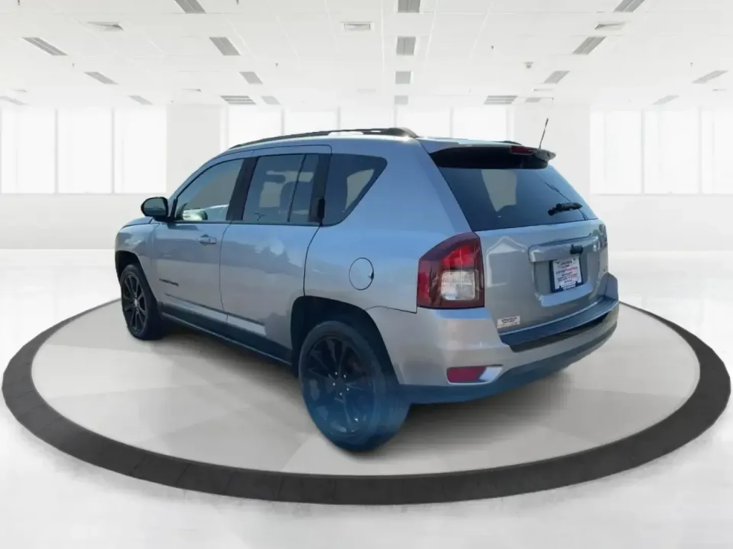 2015 Jeep Compass Altitude Edition (1C4NJCBA6FD) with an 2L I-4 DOHC engine, Continuously Variable Transmission (CVT) transmission, located at 8750 N County Rd 25A, Piqua, OH, 45356, (937) 908-9800, 40.164391, -84.232513 - **Adventure Awaits in the 2015 Jeep Compass Altitude Edition at Advantage Car and Credit - Fairborn!**<br /> <br /> Are you ready for your next adventure? The 2015 Jeep Compass Altitude Edition is your perfect companion for weekend getaways, family road trips, or even your daily commute! This versat - Photo#4