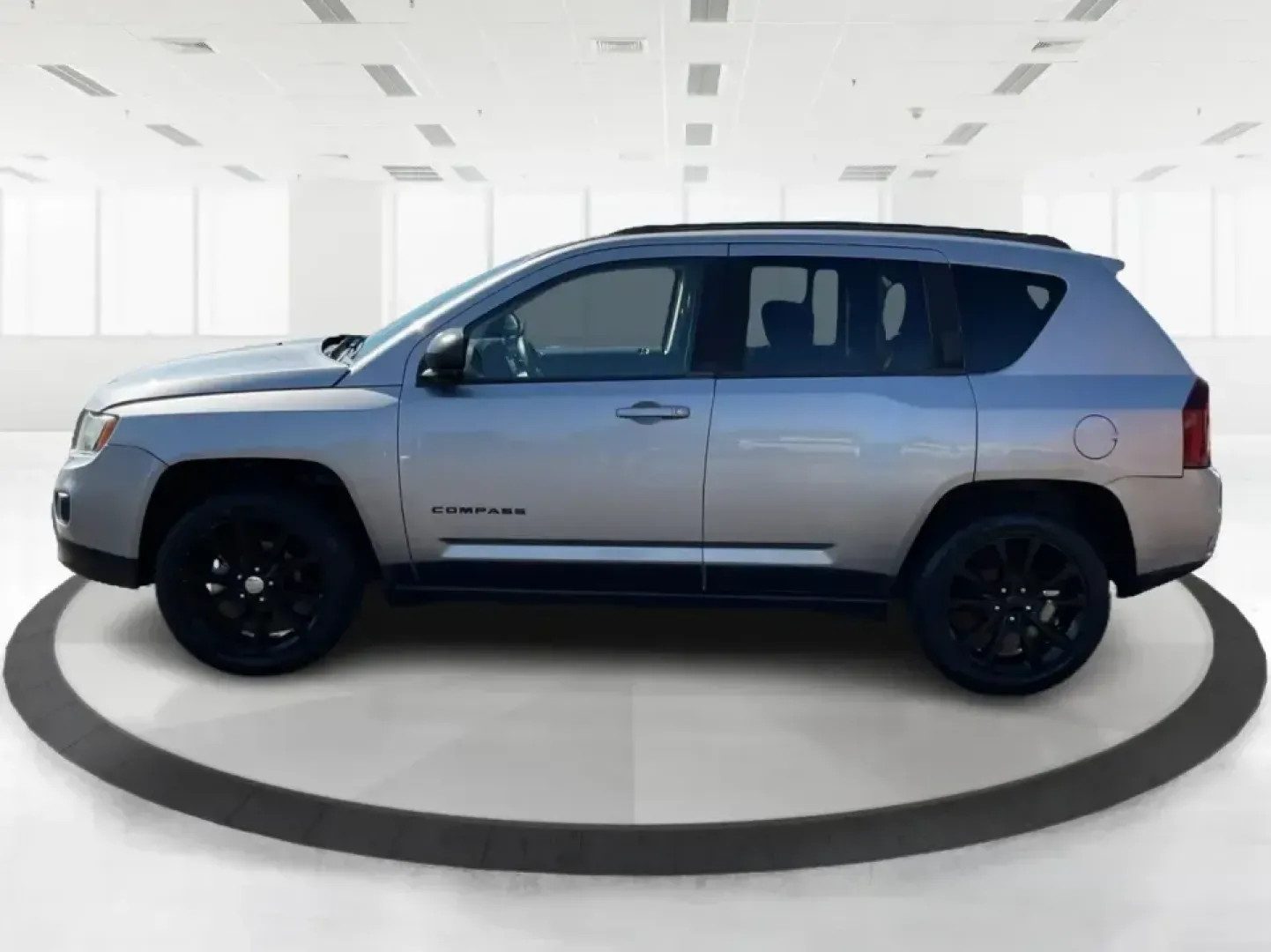 2015 Jeep Compass Altitude Edition (1C4NJCBA6FD) with an 2L I-4 DOHC engine, Continuously Variable Transmission (CVT) transmission, located at 8750 N County Rd 25A, Piqua, OH, 45356, (937) 908-9800, 40.164391, -84.232513 - **Adventure Awaits in the 2015 Jeep Compass Altitude Edition at Advantage Car and Credit - Fairborn!**<br /> <br /> Are you ready for your next adventure? The 2015 Jeep Compass Altitude Edition is your perfect companion for weekend getaways, family road trips, or even your daily commute! This versat - Photo#5