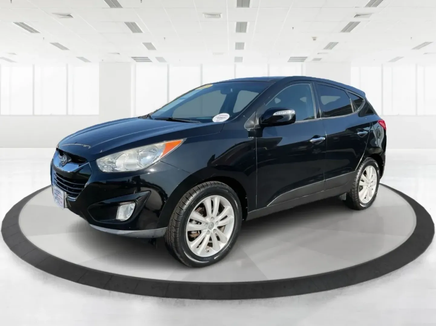2013 Hyundai Tucson Limited (KM8JUCAC1DU) with an Theta II 2.4L I-4 DOHC engine, located at 880 E. National Road, Vandalia, OH, 45377, (937) 908-9800, 39.891918, -84.183594 - **Adventure Awaits: Discover the 2013 Hyundai Tucson Limited at Advantage Car and Credit - Vandalia!**<br /> <br /> Are you ready for your next family road trip or weekend adventure? The 2013 Hyundai Tucson Limited is here to elevate your driving experience while accommodating the needs of your life - Photo#7