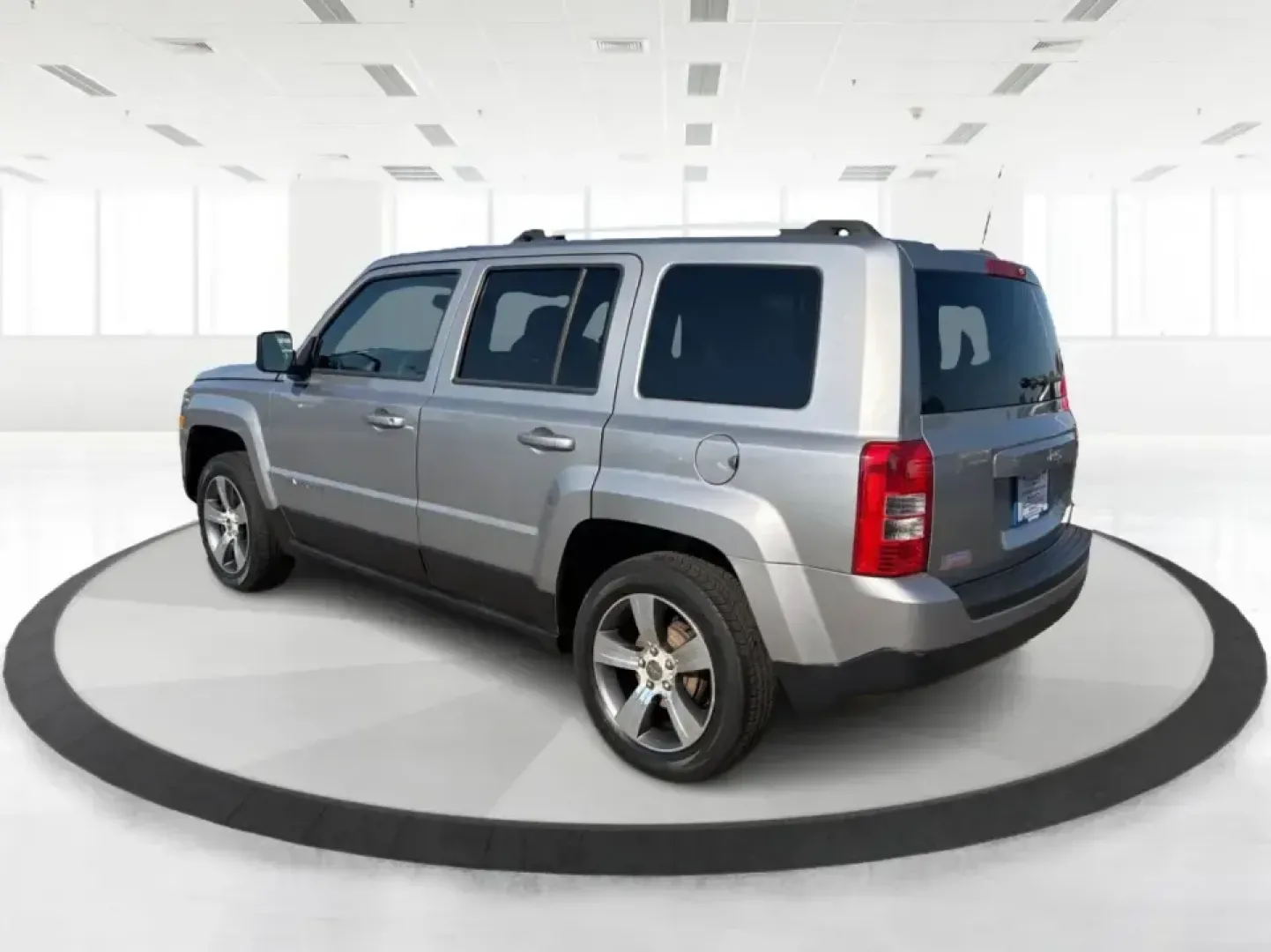 2016 Jeep Patriot Latitude 2WD (1C4NJPFA3GD) with an 2.0L L4 DOHC 16V engine, automatic transmission, located at 1099 N County Rd 25A , Troy, OH, 45373, (937) 908-9800, 40.057079, -84.212883 - Need a practical SUV that fits real life in Troy-school drop-offs, a daily commute down I75, or a weekend run to Charleston Falls Preserve? This 2016 Jeep Patriot Latitude 2WD delivers the easy-to-live-with size and versatility drivers love, with the comfort and tech features that make every mile fe- Photo#4