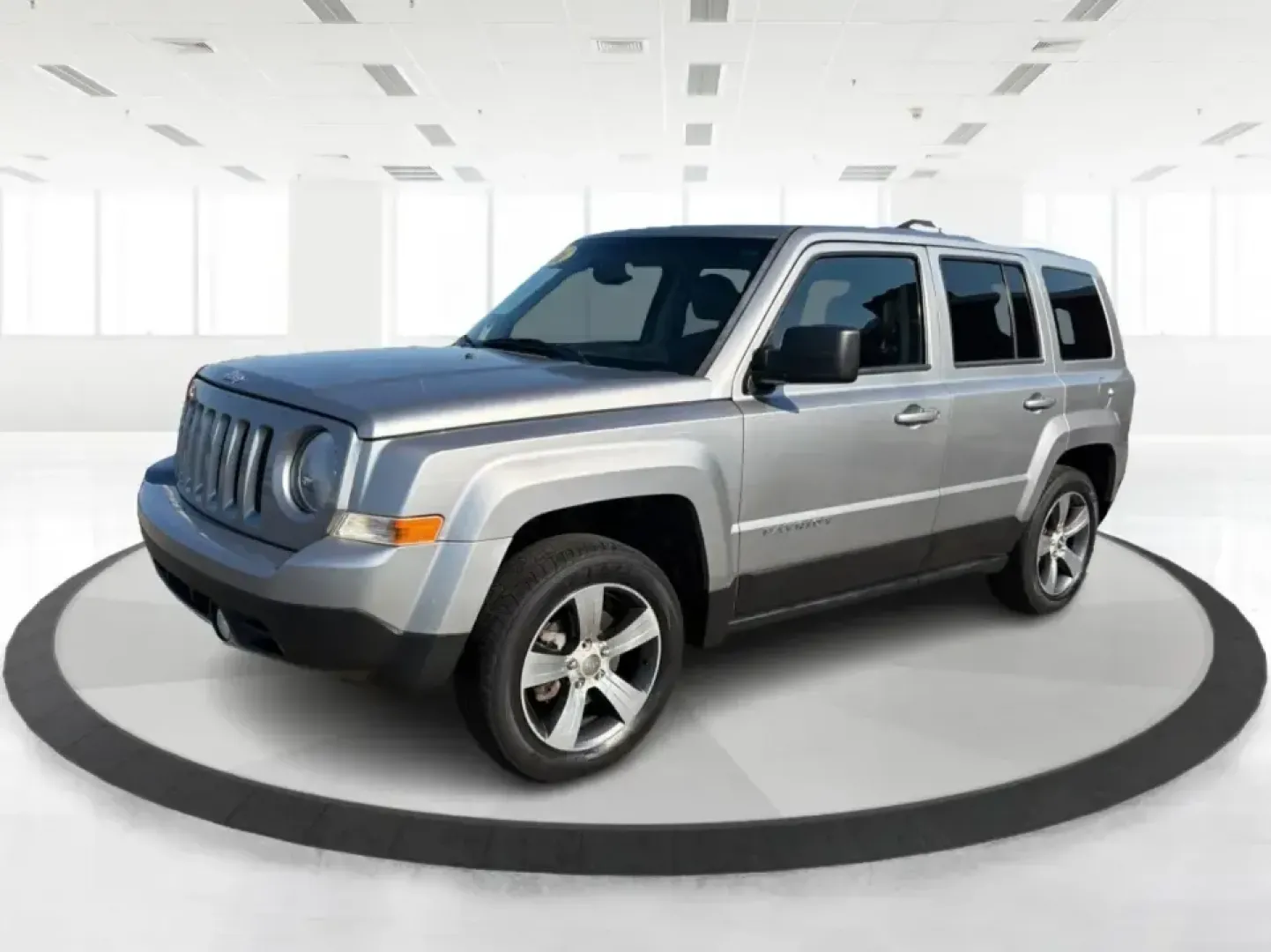 2016 Jeep Patriot Latitude 2WD (1C4NJPFA3GD) with an 2.0L L4 DOHC 16V engine, automatic transmission, located at 1099 N County Rd 25A , Troy, OH, 45373, (937) 908-9800, 40.057079, -84.212883 - Need a practical SUV that fits real life in Troy-school drop-offs, a daily commute down I75, or a weekend run to Charleston Falls Preserve? This 2016 Jeep Patriot Latitude 2WD delivers the easy-to-live-with size and versatility drivers love, with the comfort and tech features that make every mile fe- Photo#8