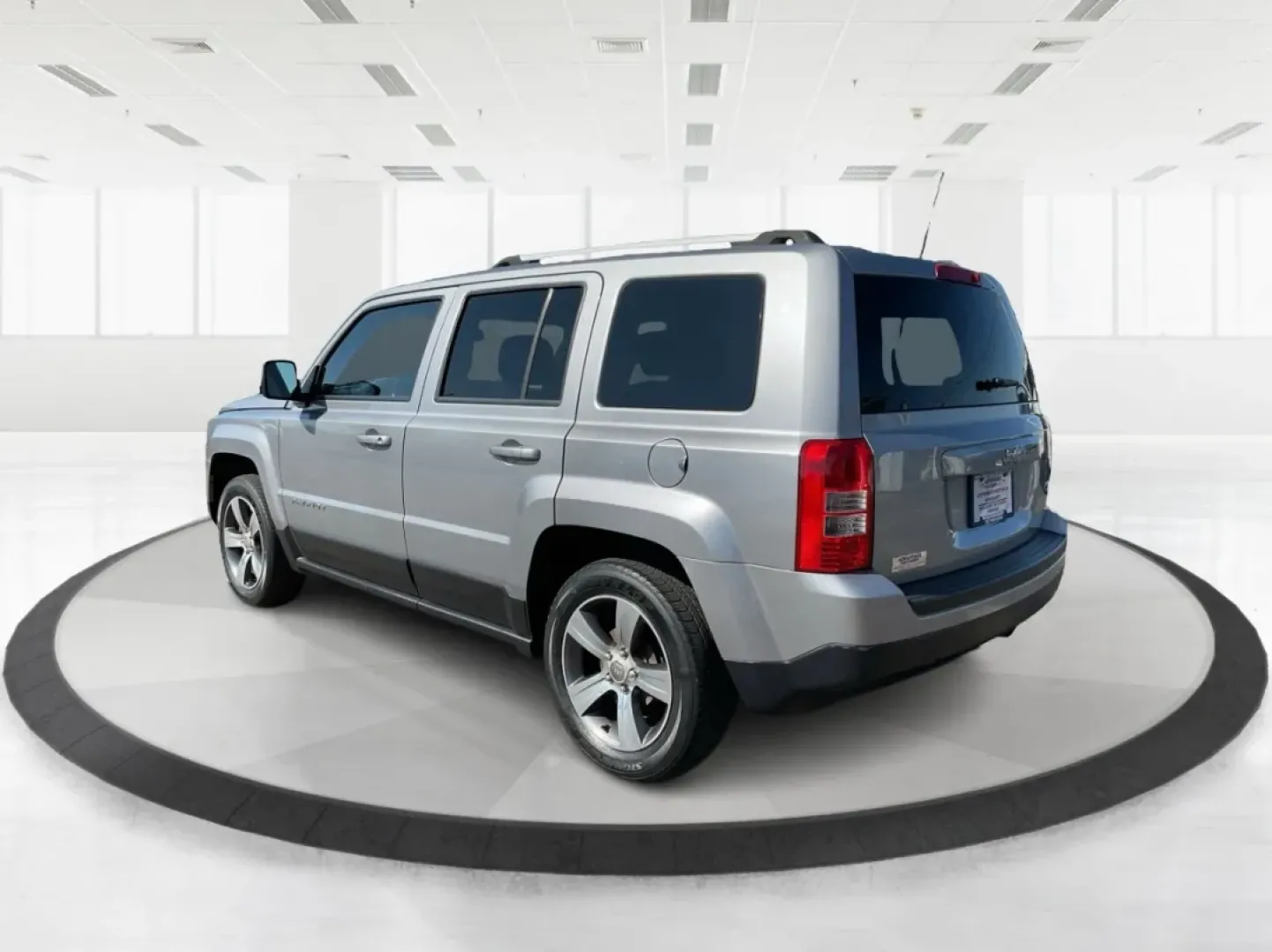 2016 Jeep Patriot High Altitude Edition (1C4NJPFA3GD) with an 2L I-4 DOHC engine, located at 1951 S Dayton Lakeview Rd., New Carlisle, OH, 45344, (937) 908-9800, 39.890999, -84.050255 - Explore the open roads and off-the-beaten-path adventures with this stunning 2016 Jeep Patriot High Altitude Edition, available now at Advantage Car and Credit in New Carlisle, OH. If you're a weekend warrior looking for a reliable and versatile SUV that accommodates your active lifestyle, this Jeep - Photo#4