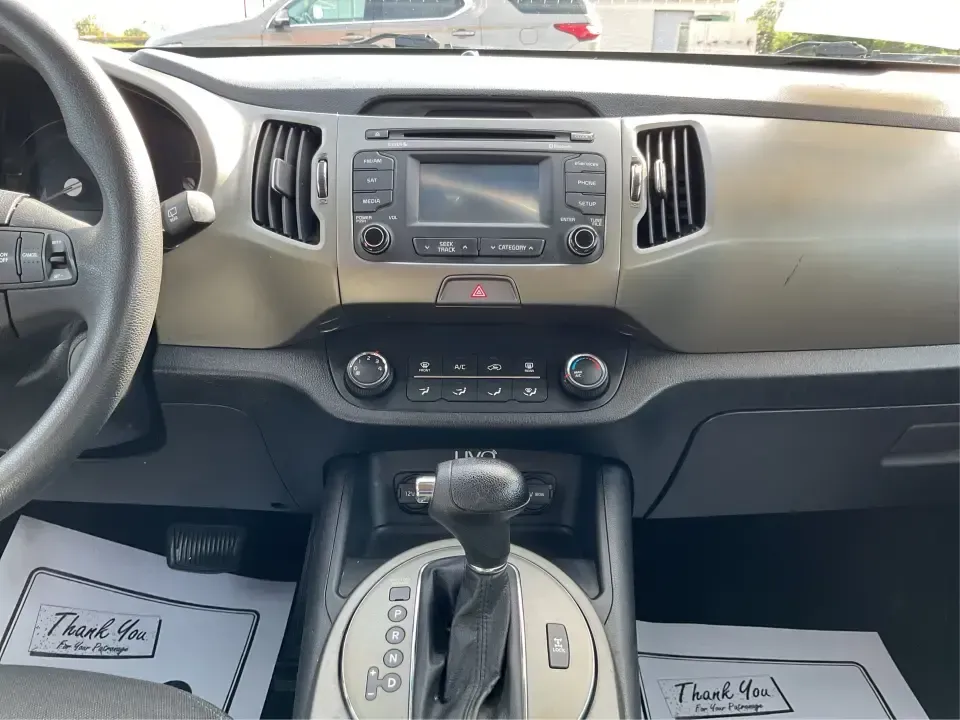 2015 Kia Sportage LX (KNDPBCAC2F7) with an 2.4L V6 DOHC 24V engine, 6-Speed Automatic transmission, located at 1099 N County Rd 25A , Troy, OH, 45373, (937) 908-9800, 40.057079, -84.212883 - Are you ready to elevate your driving experience and embark on unforgettable adventures? Look no further than this 2015 Kia Sportage LX, perfect for those who crave a reliable crossover that blends style with versatility. Whether you're commuting to work, shuttling the kids to school, or planning a - Photo#13