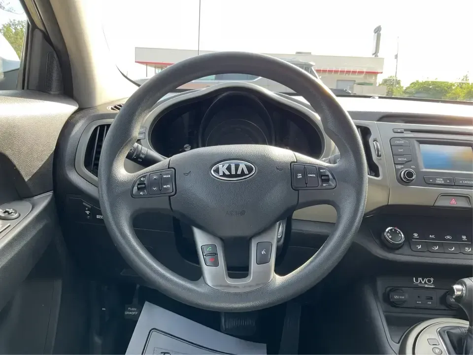 2015 Kia Sportage LX (KNDPBCAC2F7) with an 2.4L V6 DOHC 24V engine, 6-Speed Automatic transmission, located at 1099 N County Rd 25A , Troy, OH, 45373, (937) 908-9800, 40.057079, -84.212883 - Are you ready to elevate your driving experience and embark on unforgettable adventures? Look no further than this 2015 Kia Sportage LX, perfect for those who crave a reliable crossover that blends style with versatility. Whether you're commuting to work, shuttling the kids to school, or planning a - Photo#16