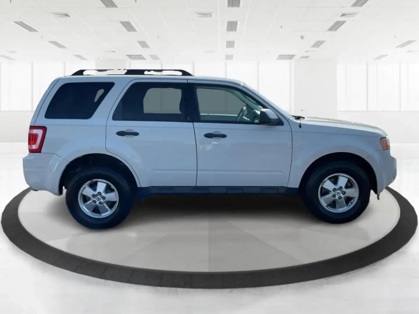 2012 Ford Escape XLT (1FMCU9D7XCK) with an Other engine, located at 1099 N County Rd 25A , Troy, OH, 45373, (937) 908-9800, 40.057079, -84.212883 - Discover the perfect balance of comfort and capability with the 2012 Ford Escape XLT, now available at Advantage Car and Credit - Troy. If you're seeking a versatile SUV that accommodates the demands of everyday life-from school runs to weekend adventures-this vehicle is tailored for you. With its r - Photo#1