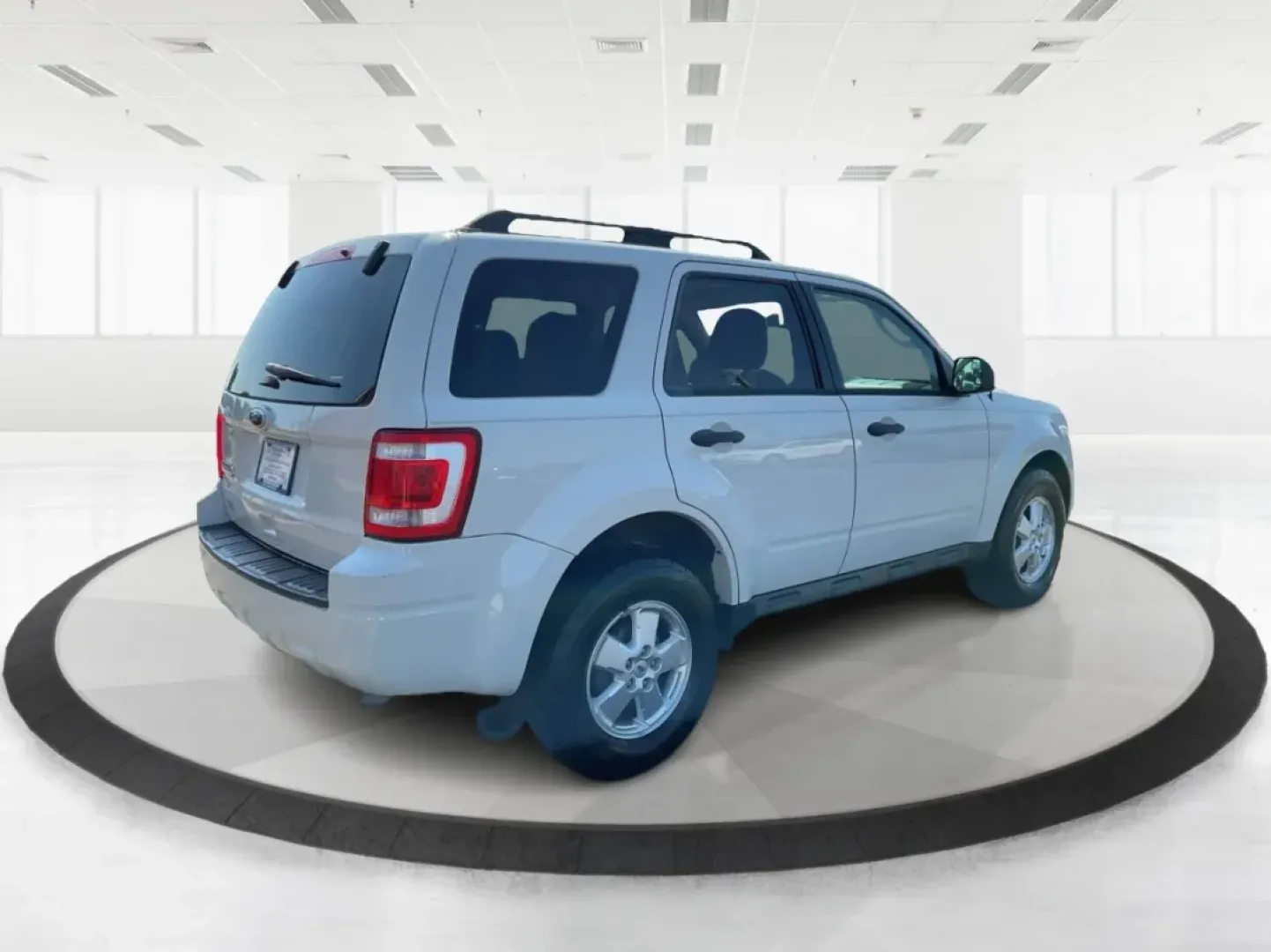 2012 Ford Escape XLT (1FMCU9D7XCK) with an Other engine, located at 1099 N County Rd 25A , Troy, OH, 45373, (937) 908-9800, 40.057079, -84.212883 - Discover the perfect balance of comfort and capability with the 2012 Ford Escape XLT, now available at Advantage Car and Credit - Troy. If you're seeking a versatile SUV that accommodates the demands of everyday life-from school runs to weekend adventures-this vehicle is tailored for you. With its r - Photo#2
