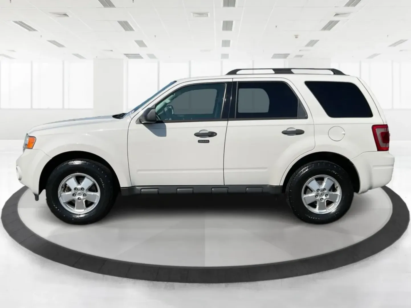 2012 Ford Escape XLT (1FMCU9D7XCK) with an Other engine, located at 1099 N County Rd 25A , Troy, OH, 45373, (937) 908-9800, 40.057079, -84.212883 - Discover the perfect balance of comfort and capability with the 2012 Ford Escape XLT, now available at Advantage Car and Credit - Troy. If you're seeking a versatile SUV that accommodates the demands of everyday life-from school runs to weekend adventures-this vehicle is tailored for you. With its r - Photo#5