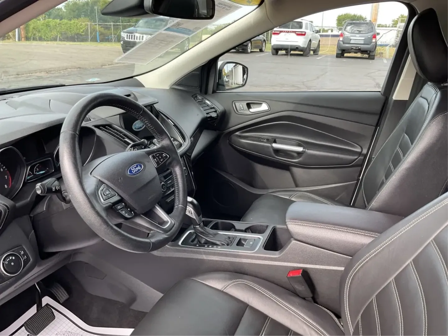 2018 Ford Escape Titanium (1FMCU9J97JU) with an EcoBoost 2L I-4 gasoline direct injection engine, located at 8750 N County Rd 25A, Piqua, OH, 45356, (937) 908-9800, 40.164391, -84.232513 - **Unleash Adventure with Your 2018 Ford Escape Titanium Perfect for Weekend Getaways!**<br /> <br /> If you're searching for a versatile vehicle that caters to your adventurous spirit while providing the comfort and style you deserve, look no further than the stunning 2018 Ford Escape Titanium avai - Photo#9