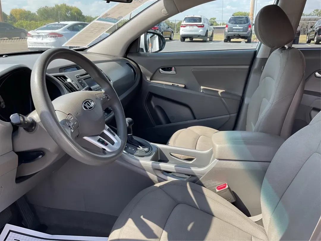 2013 Kia Sportage LX (KNDPBCA26D7) with an 2.4L I-4 DOHC engine, located at 8750 N County Rd 25A, Piqua, OH, 45356, (937) 908-9800, 40.164391, -84.232513 - Experience the ultimate blend of versatility and comfort with this 2013 Kia Sportage LX, perfect for families on the go, urban commuters, or those planning outdoor weekend adventures. This reliable crossover's spacious interior and dynamic performance make it an ideal choice for drivers seeking a de - Photo#9