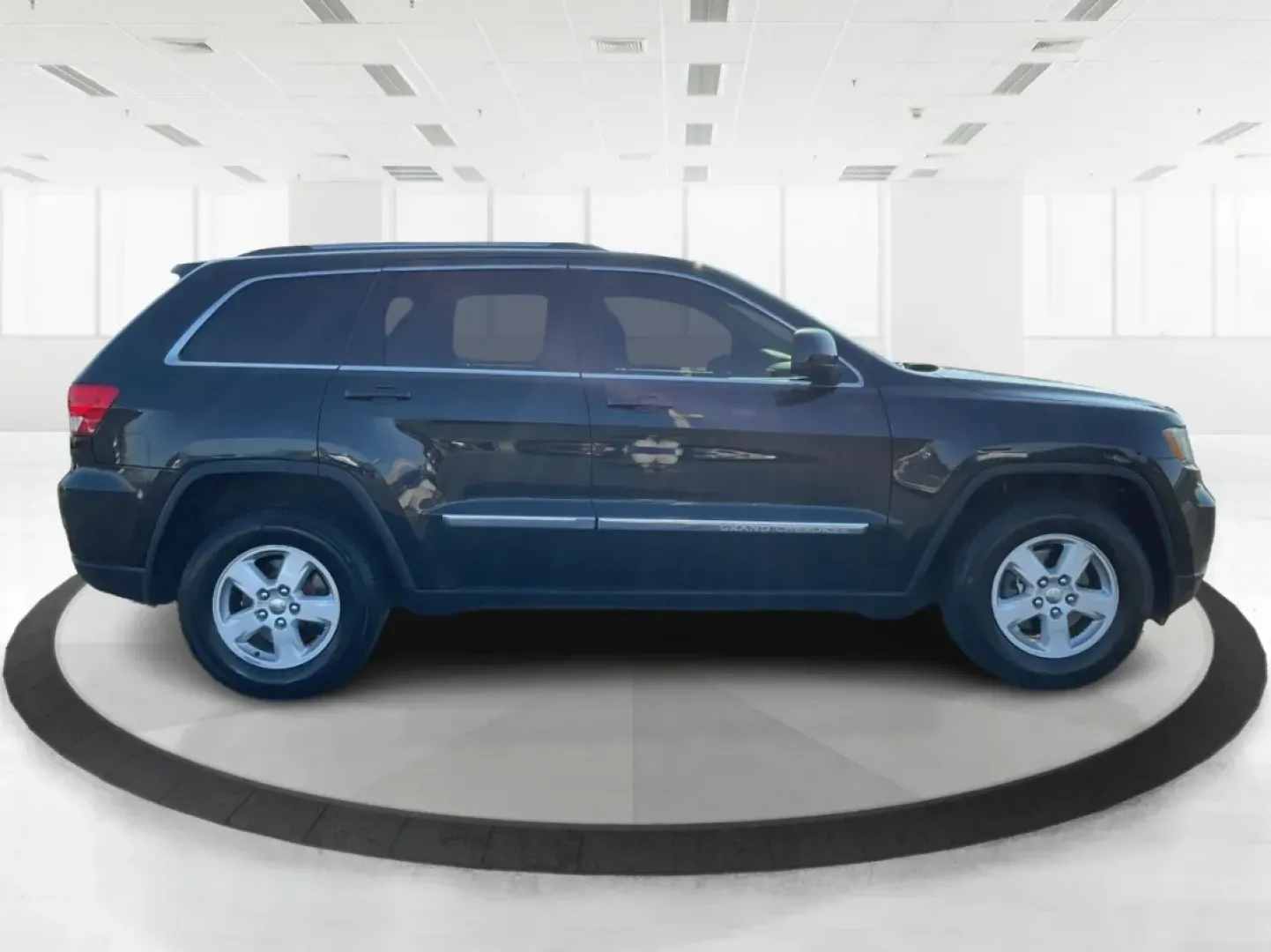 2011 Jeep Grand Cherokee Laredo (1J4RR4GG4BC) with an Other engine, located at 8750 N County Rd 25A, Piqua, OH, 45356, (937) 908-9800, 40.164391, -84.232513 - **Adventure Awaits with the 2011 Jeep Grand Cherokee Laredo at Advantage Car and Credit in Troy, OH!**<br /> <br /> Are you ready to elevate your family adventures or weekend getaways? The 2011 Jeep Grand Cherokee Laredo is the SUV that can take you there, whether it's off the beaten path or cruisin - Photo#1