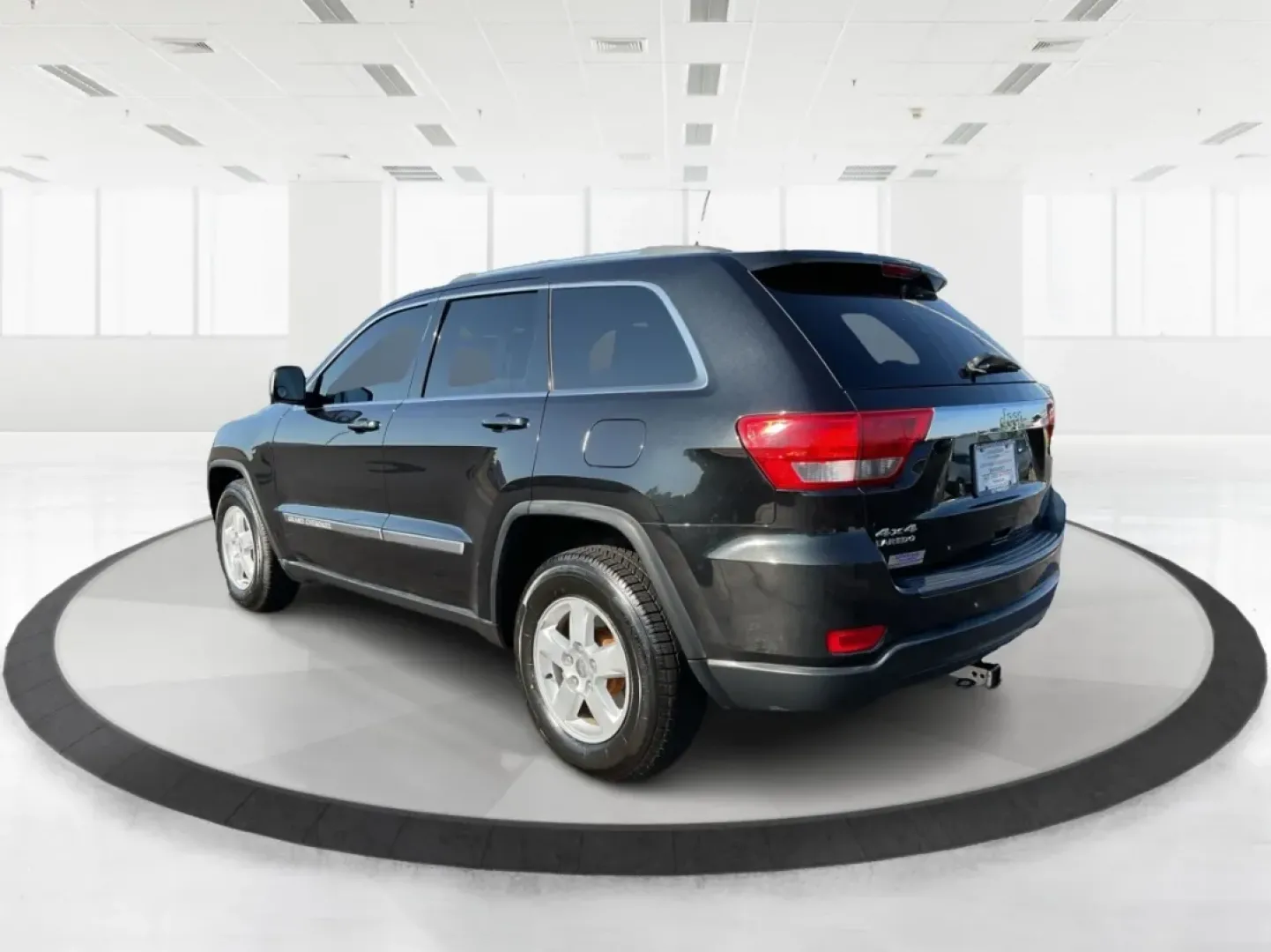 2011 Jeep Grand Cherokee Laredo (1J4RR4GG4BC) with an Other engine, located at 8750 N County Rd 25A, Piqua, OH, 45356, (937) 908-9800, 40.164391, -84.232513 - **Adventure Awaits with the 2011 Jeep Grand Cherokee Laredo at Advantage Car and Credit in Troy, OH!**<br /> <br /> Are you ready to elevate your family adventures or weekend getaways? The 2011 Jeep Grand Cherokee Laredo is the SUV that can take you there, whether it's off the beaten path or cruisin - Photo#4